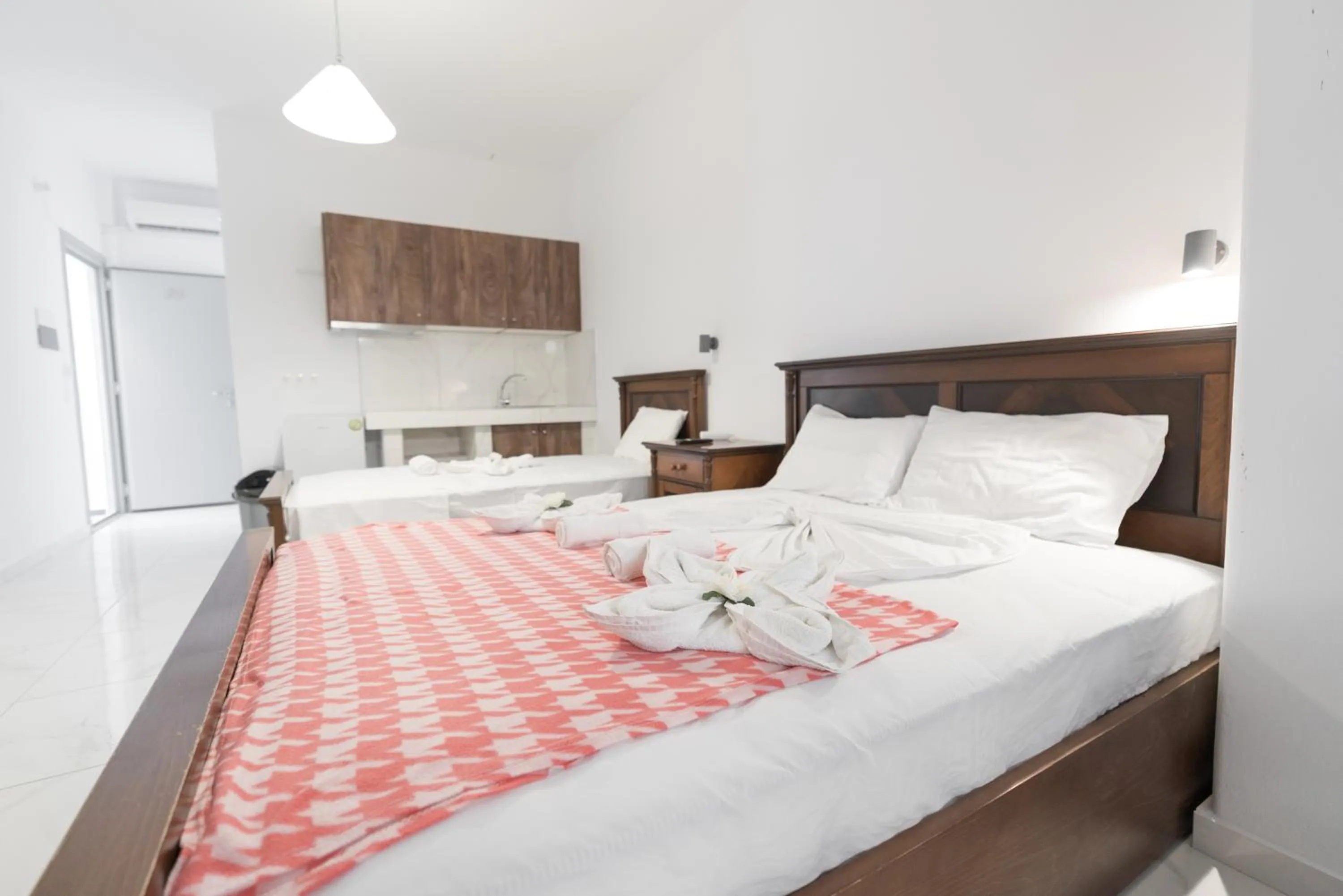 Photo of the whole room, Bed in Dodomar Selections