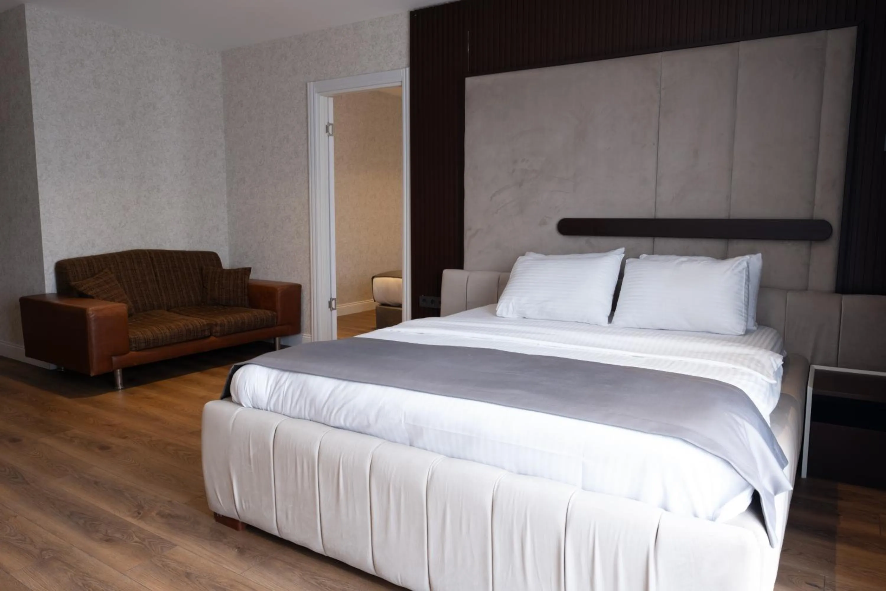 Bed in THE ROYALS HOTEL