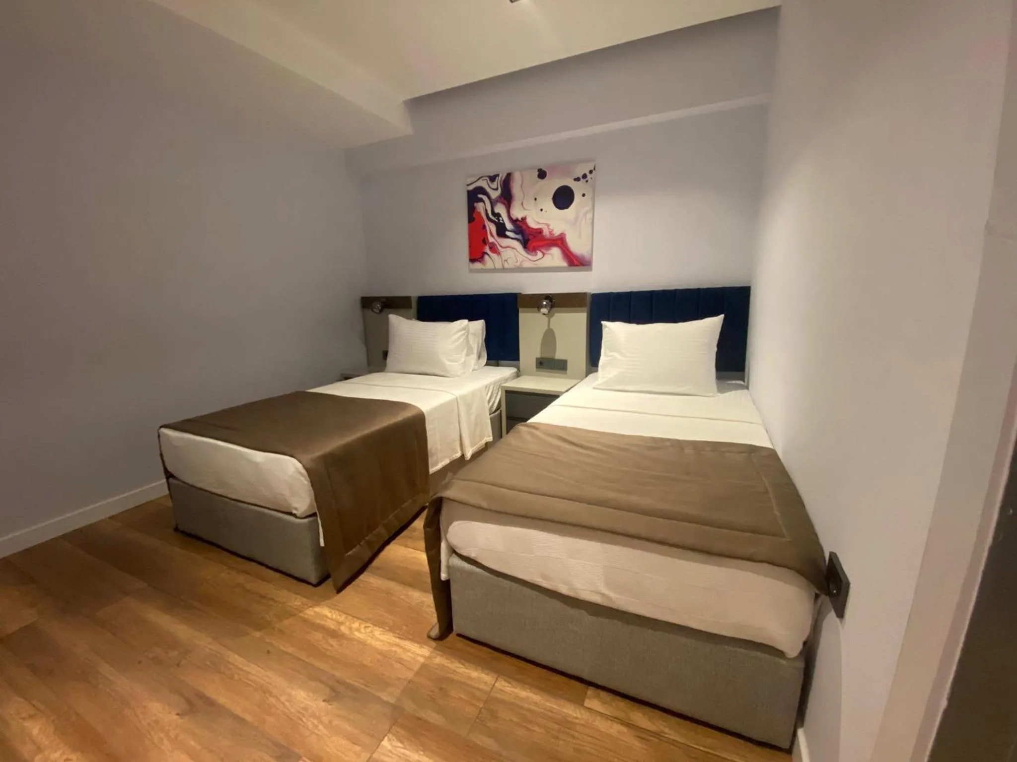 Bed in THE ROYALS HOTEL