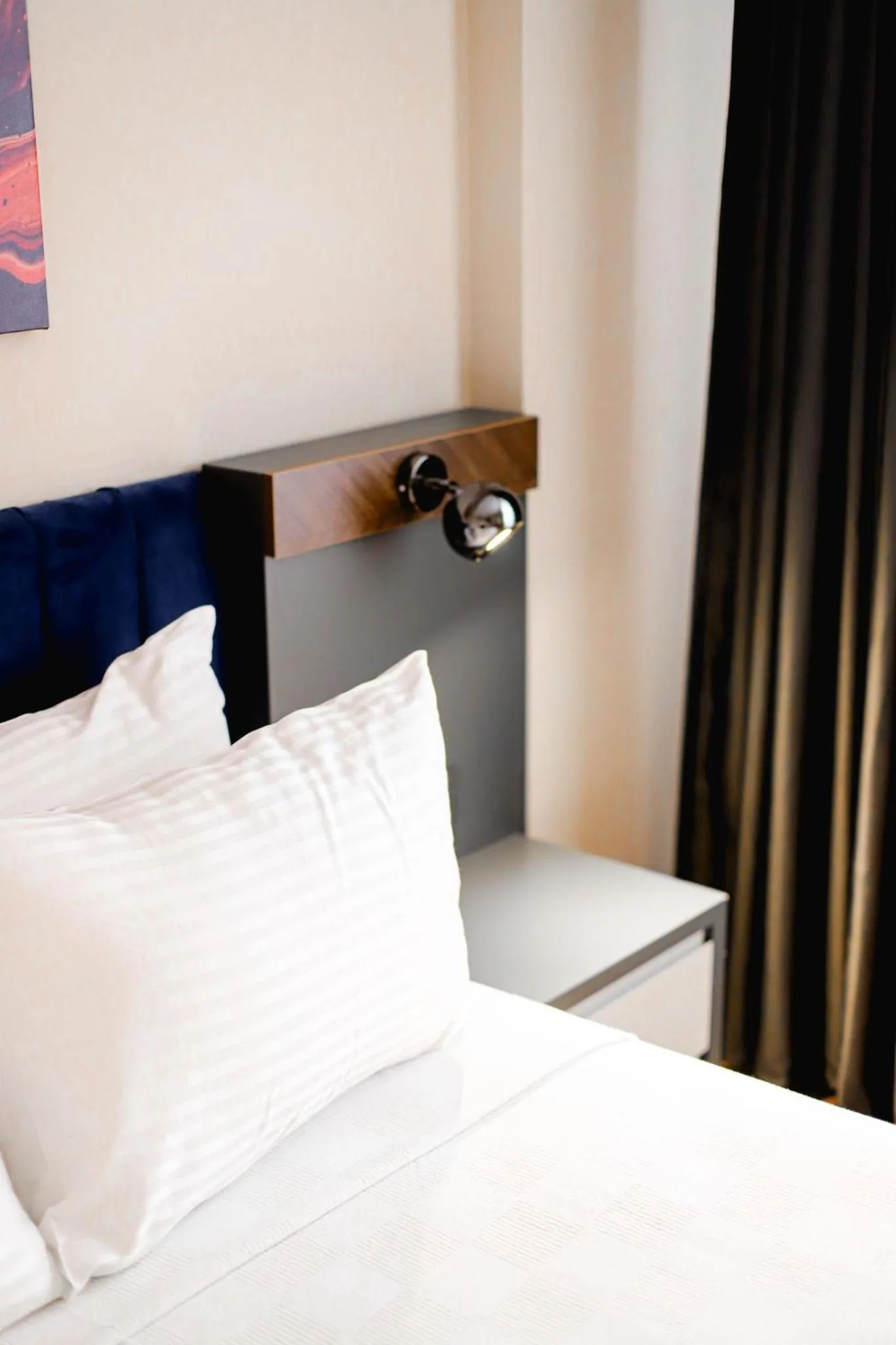 Bed in THE ROYALS HOTEL