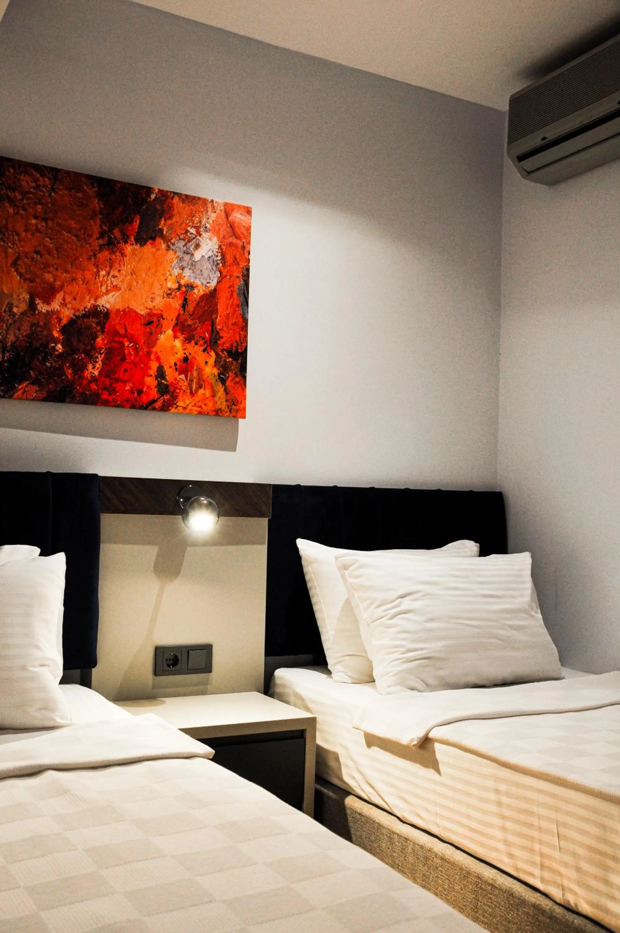 Bed in THE ROYALS HOTEL