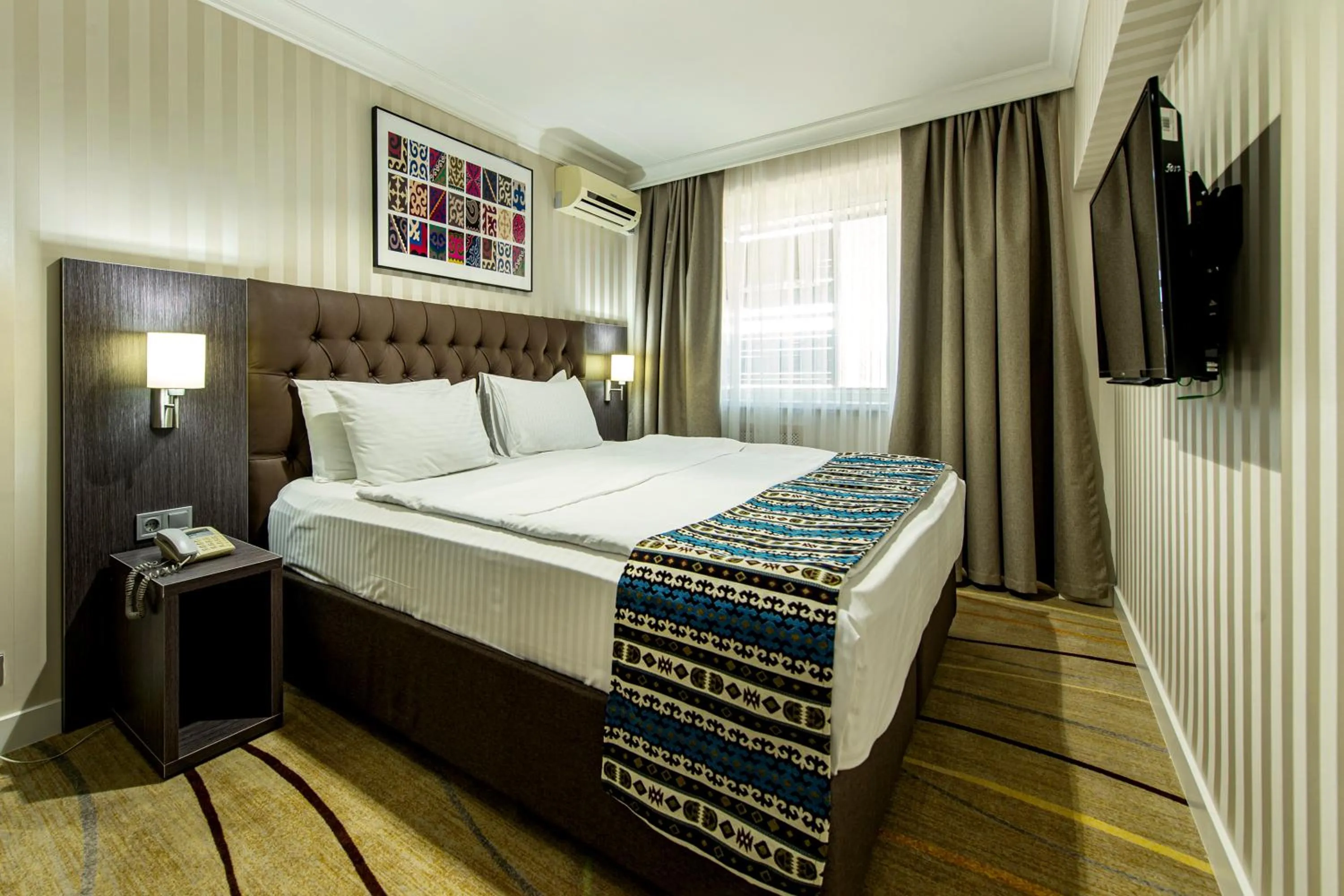 Bed in Shymkent Grand Hotel