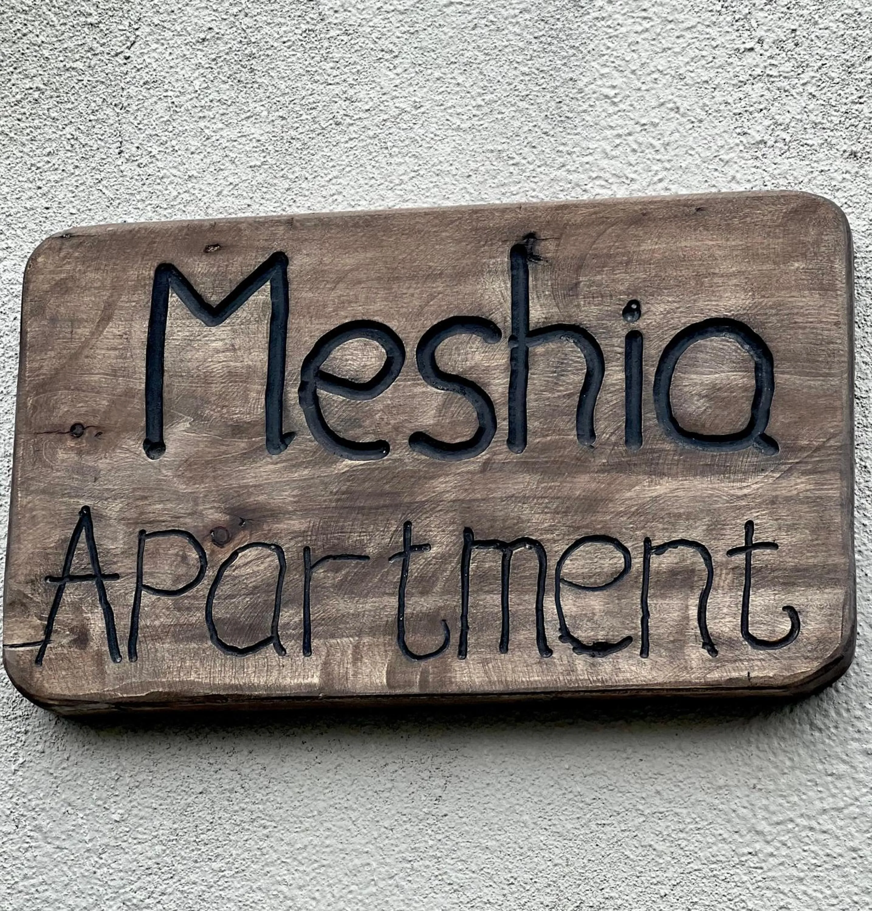 Property logo or sign in Meshia Apartment