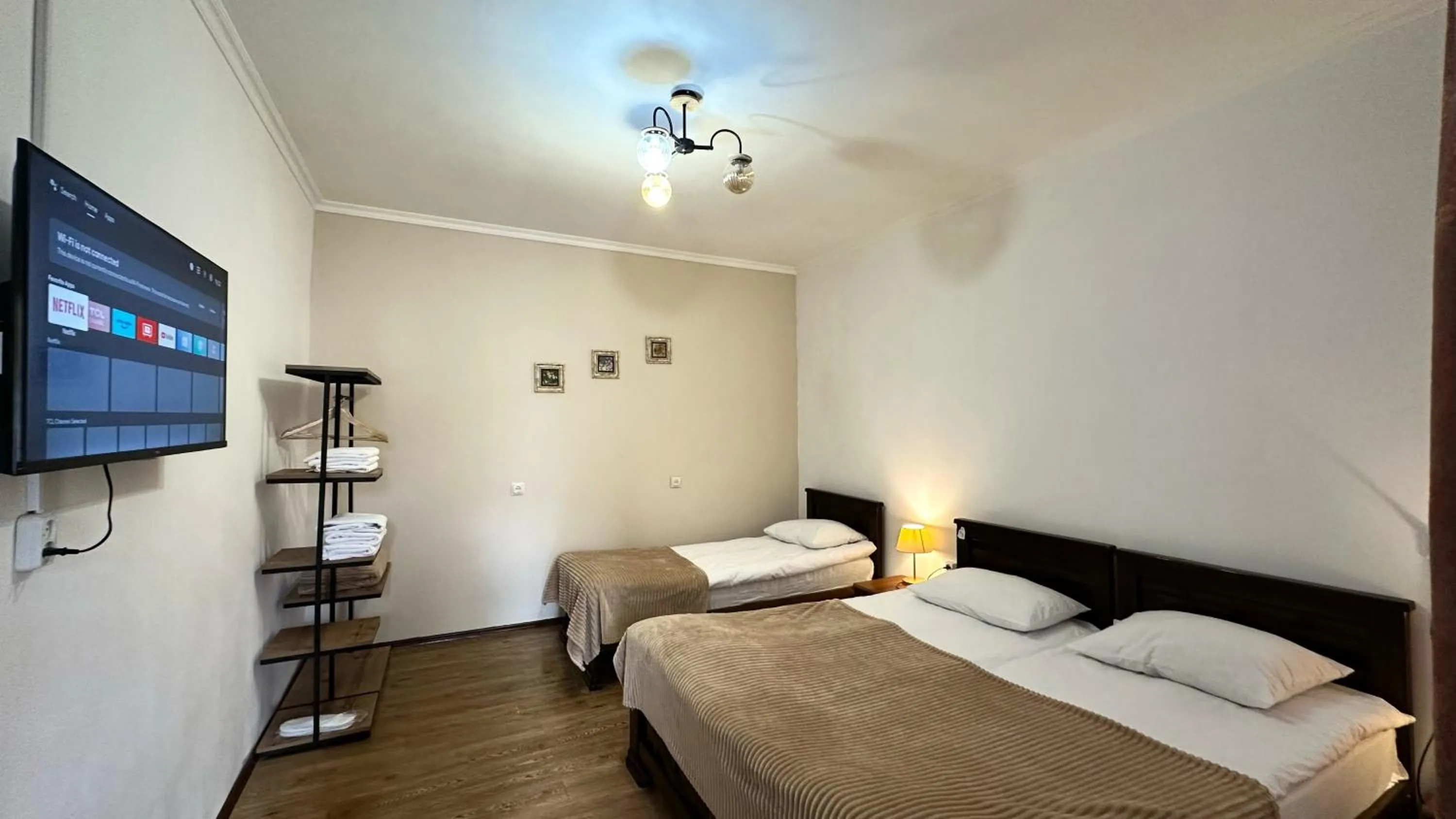 TV and multimedia, Bed in Meshia Apartment