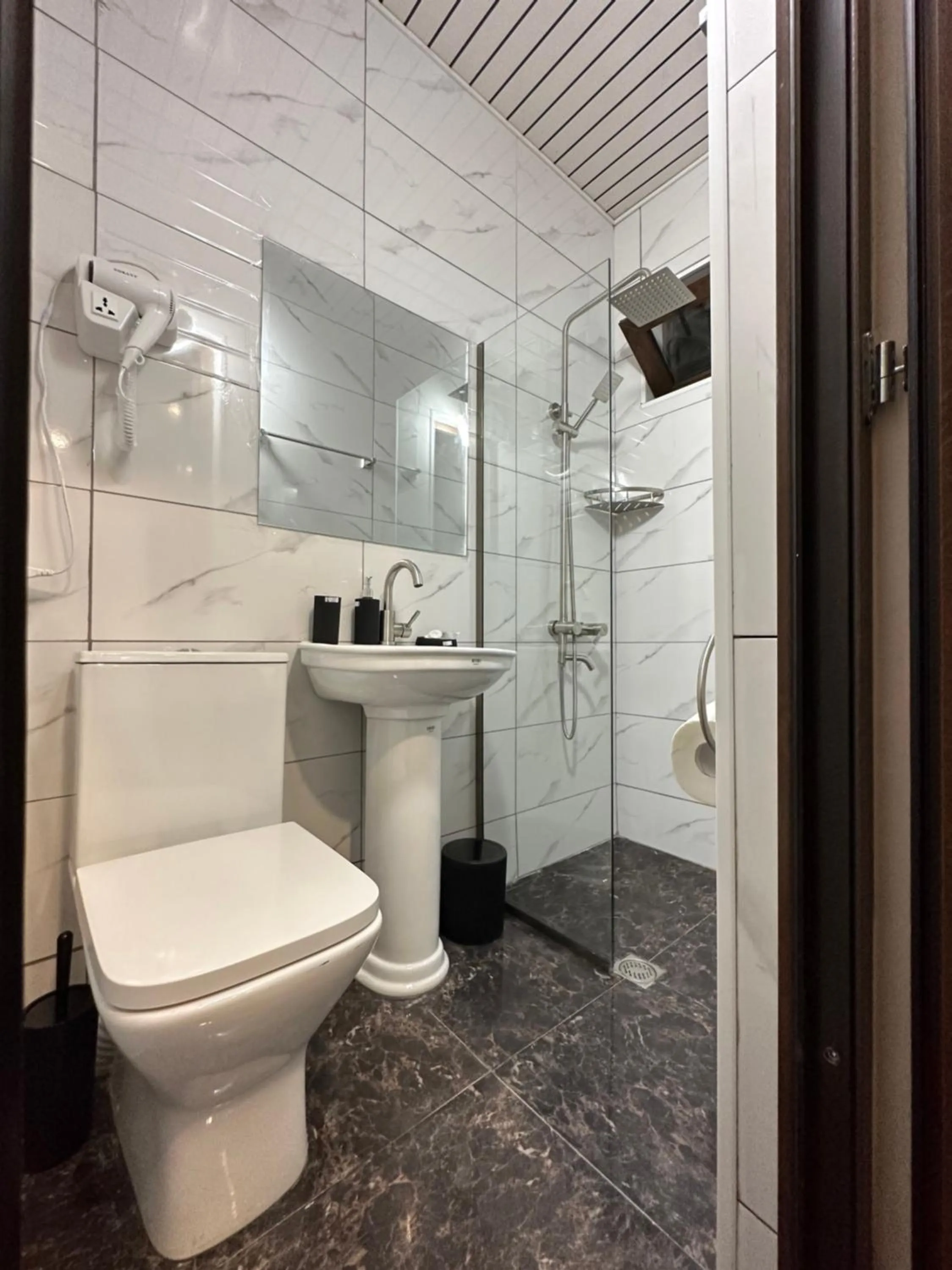 Shower in Meshia Apartment