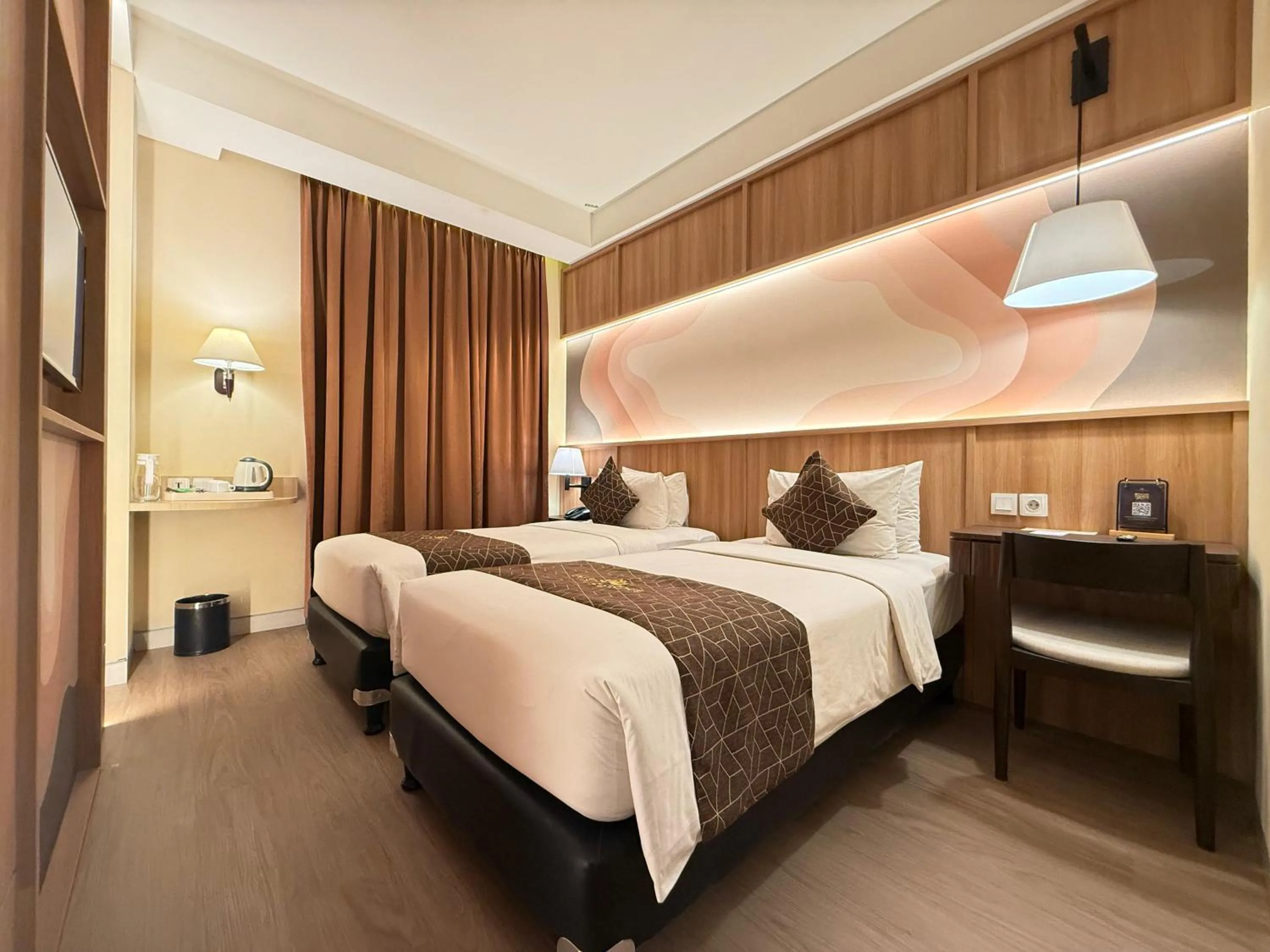 Bed in Crystal Lotus Hotel Yogyakarta