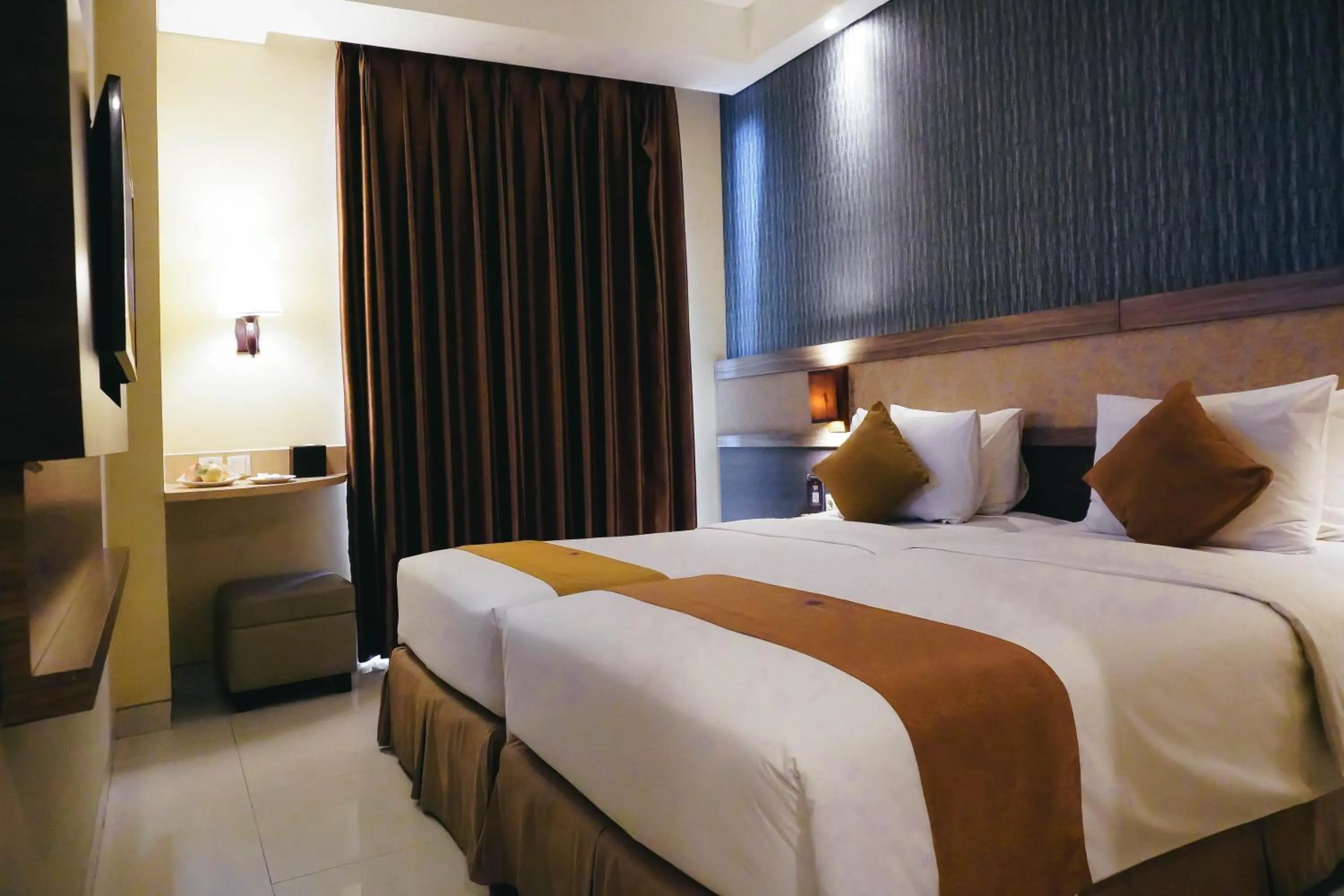 Bed in Crystal Lotus Hotel Yogyakarta