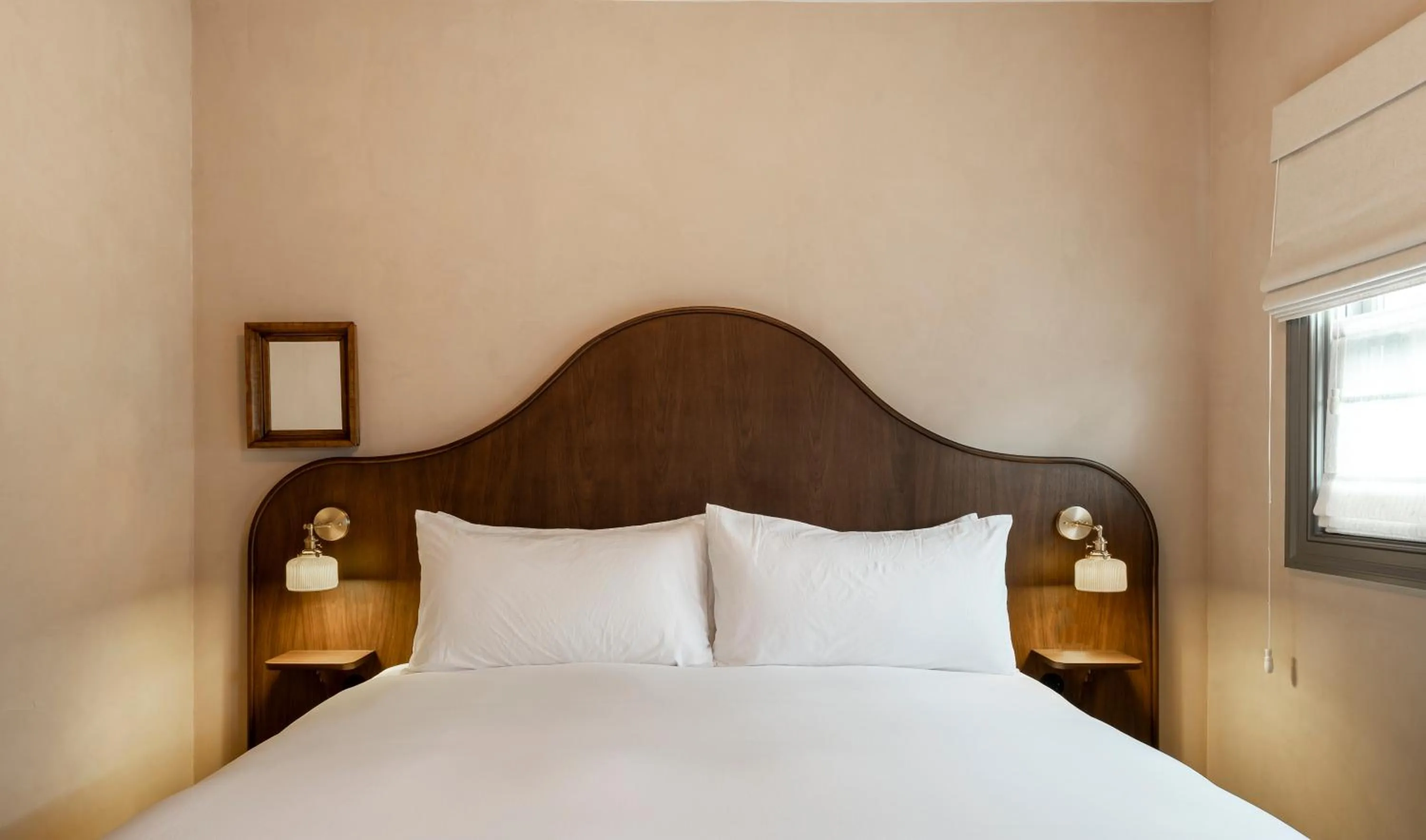 Bed in Gjelina Hotel