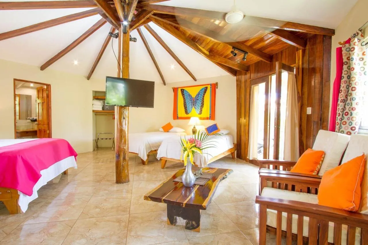 Bed in Tamarindo Village Hotel