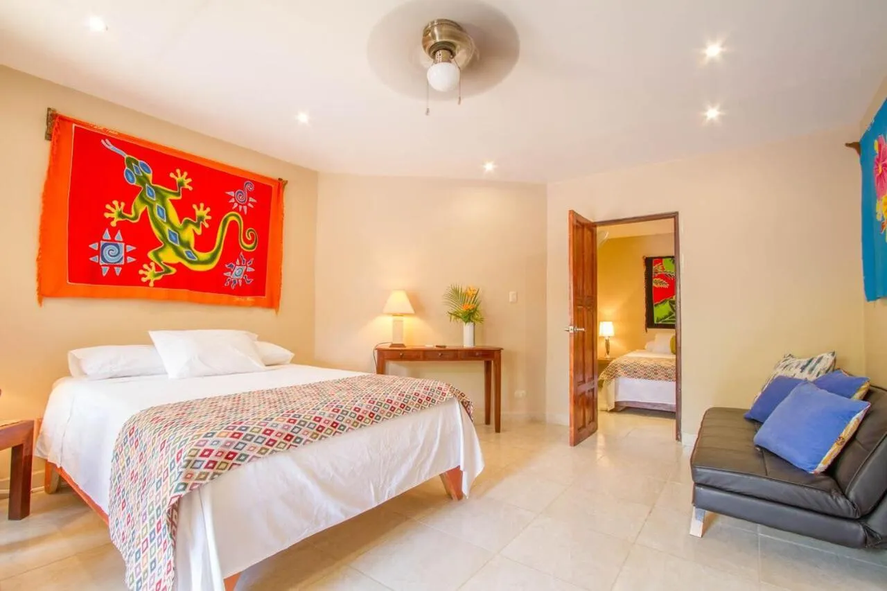Bed in Tamarindo Village Hotel