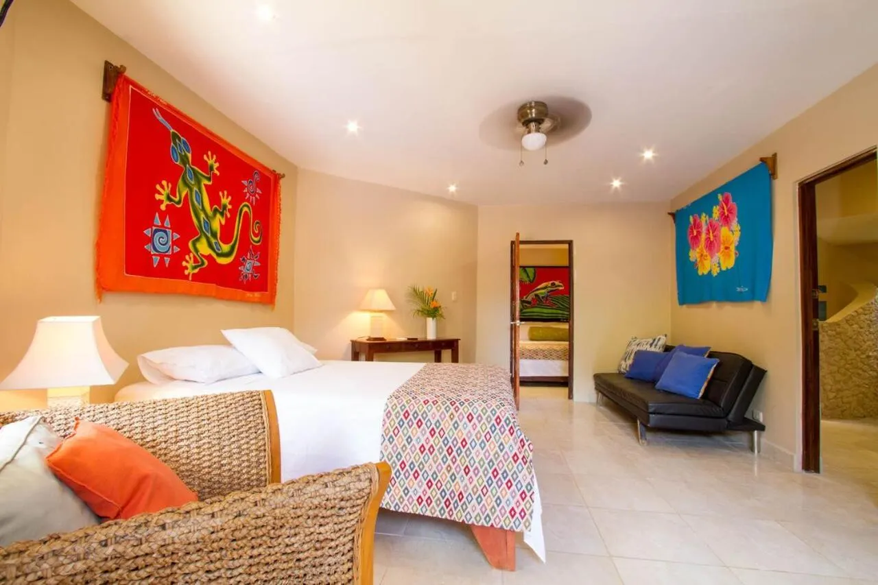 Bed in Tamarindo Village Hotel