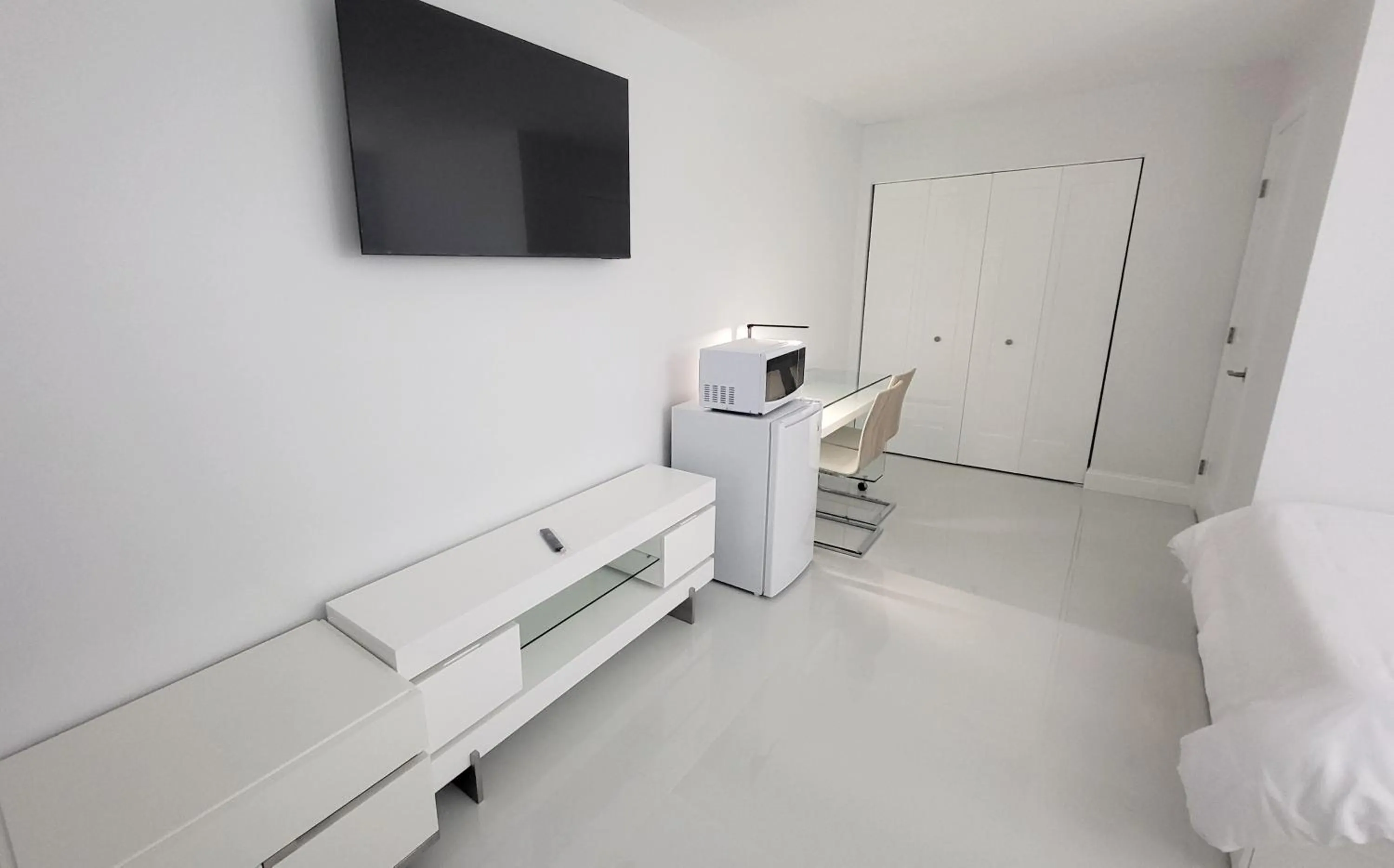 Bed in Palm Breeze Hotel