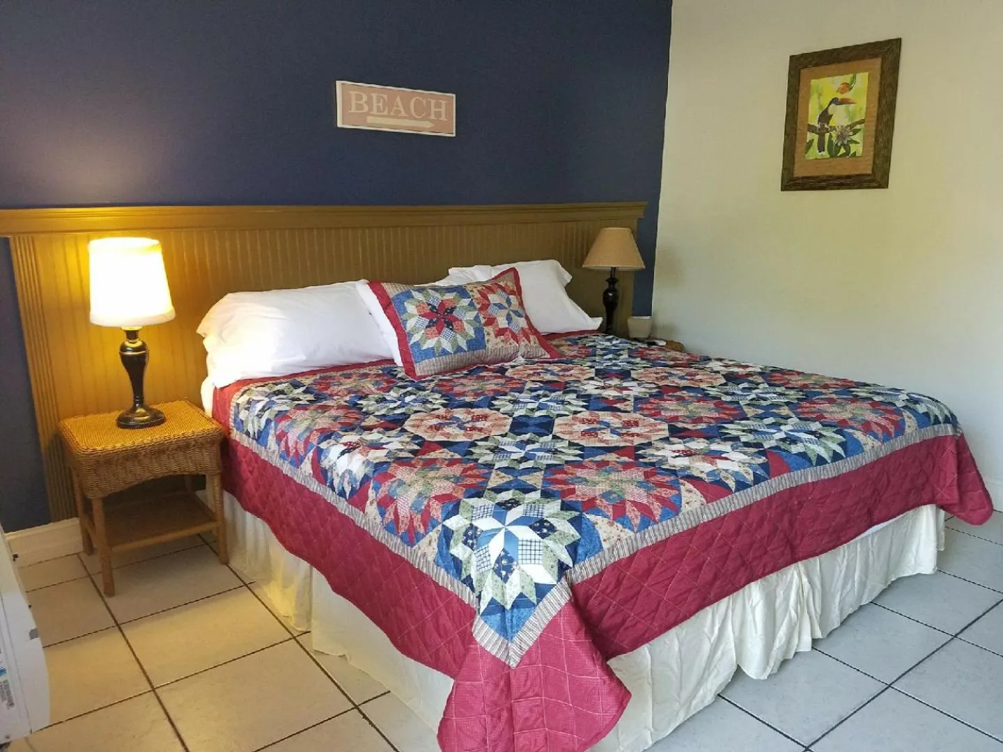 Bed in Palm Breeze Hotel