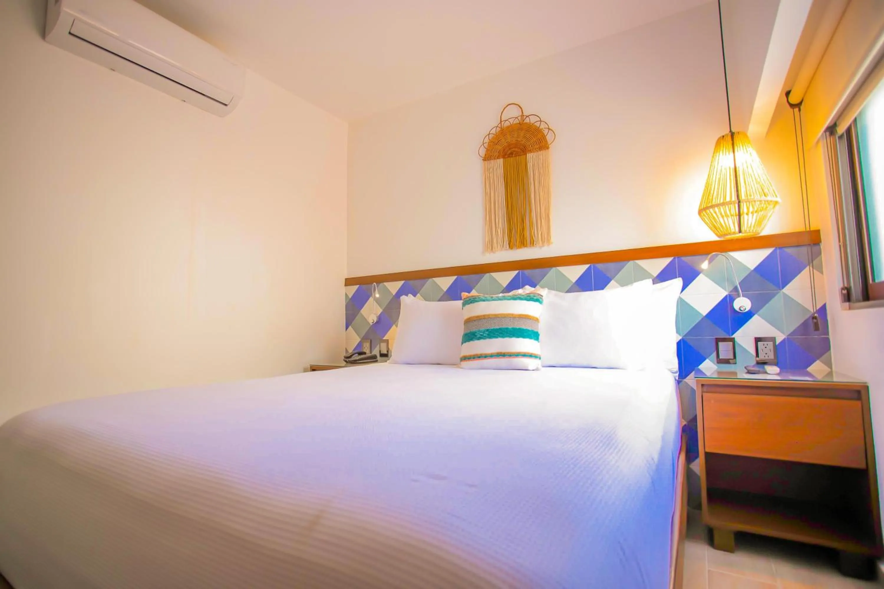 Bed in Nuxká Hotel Boutique