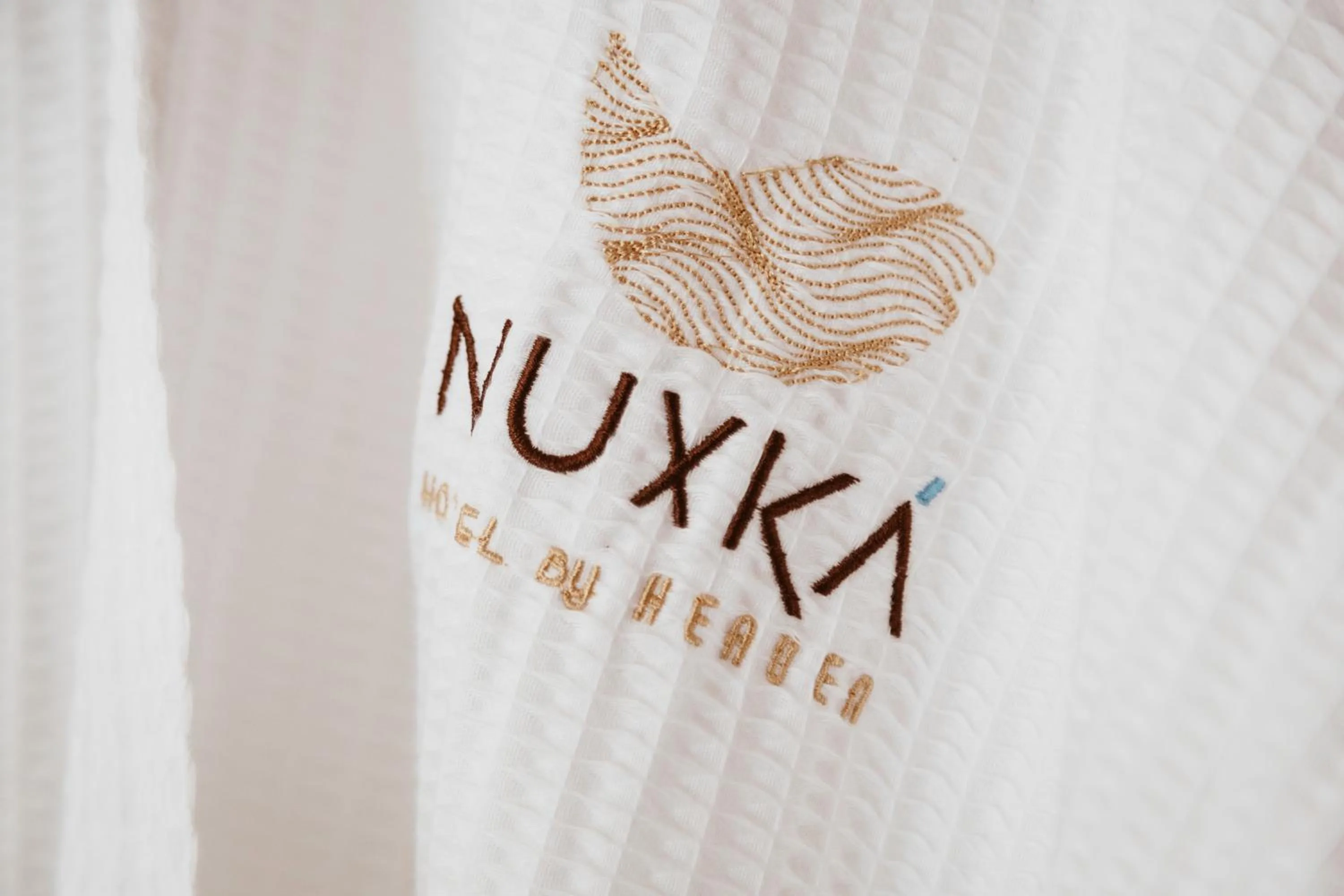 Property logo or sign in Nuxká Hotel Boutique