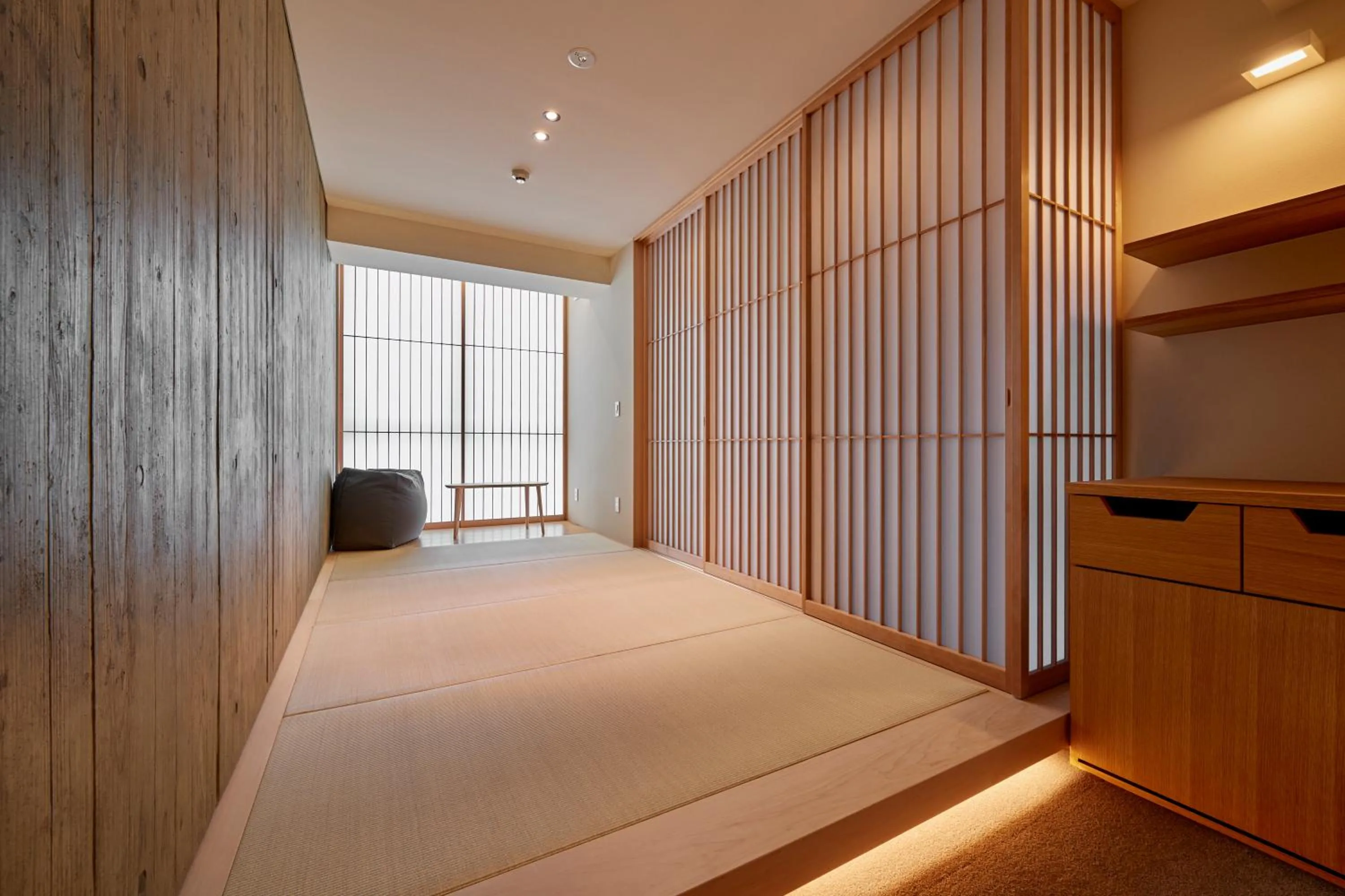 Bed in THE HOTELS HAKATA Harushige Honkan
