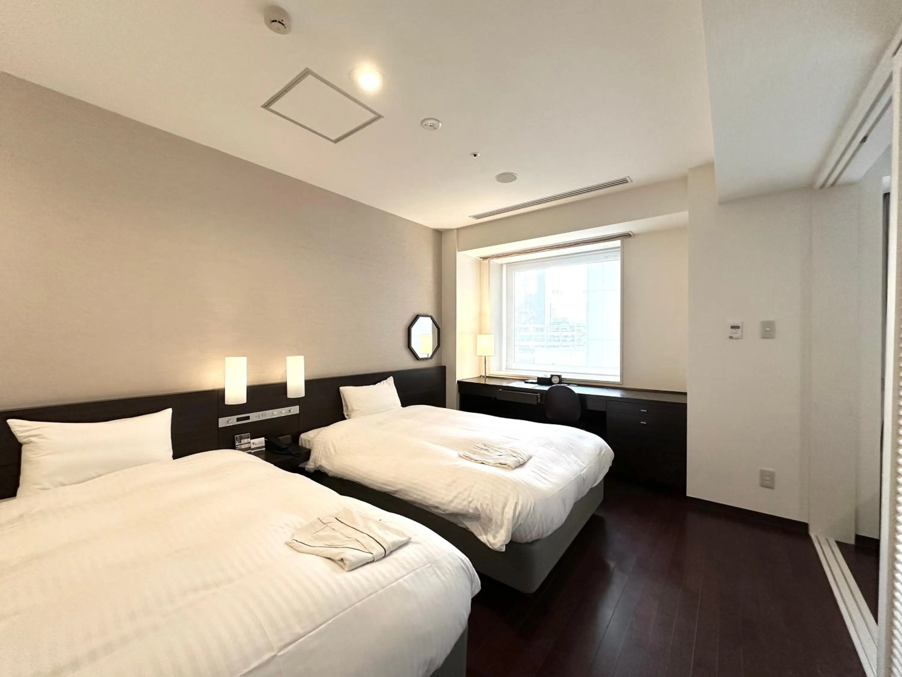 Photo of the whole room, Bed in KOKO HOTEL Sendai Kotodai Park