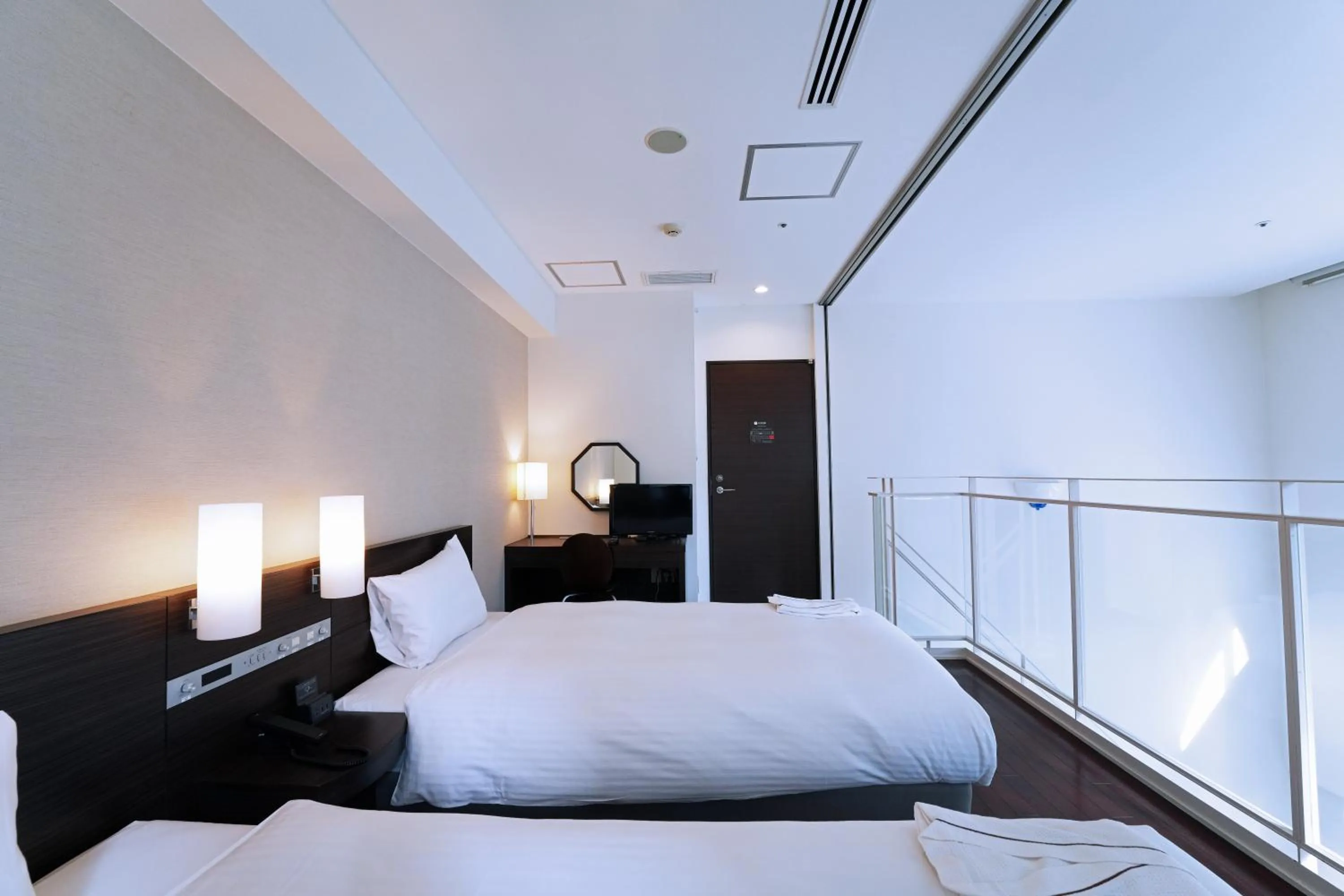 Photo of the whole room, Bed in KOKO HOTEL Sendai Kotodai Park