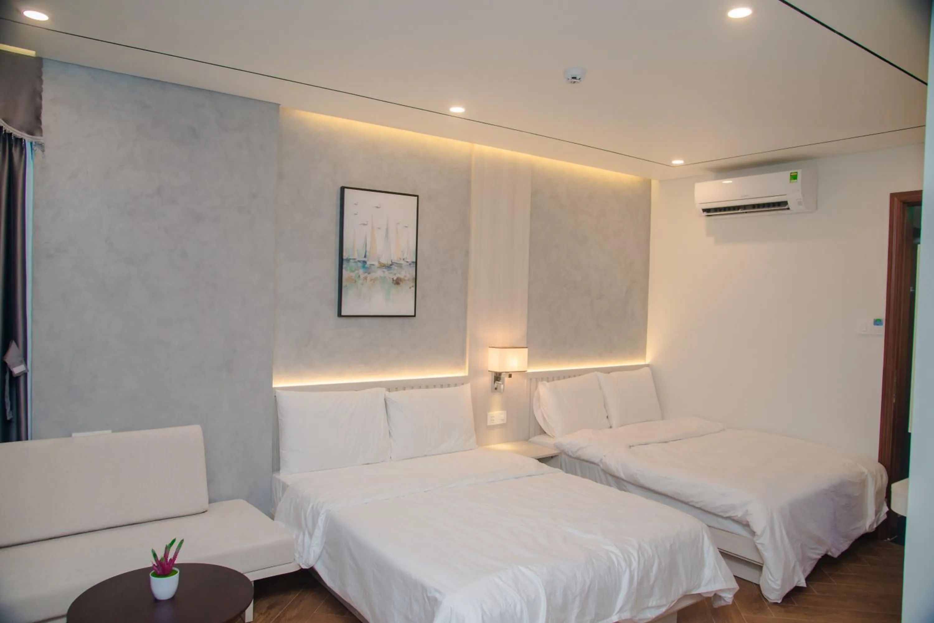 Bed in Y'S Sea House Hotel