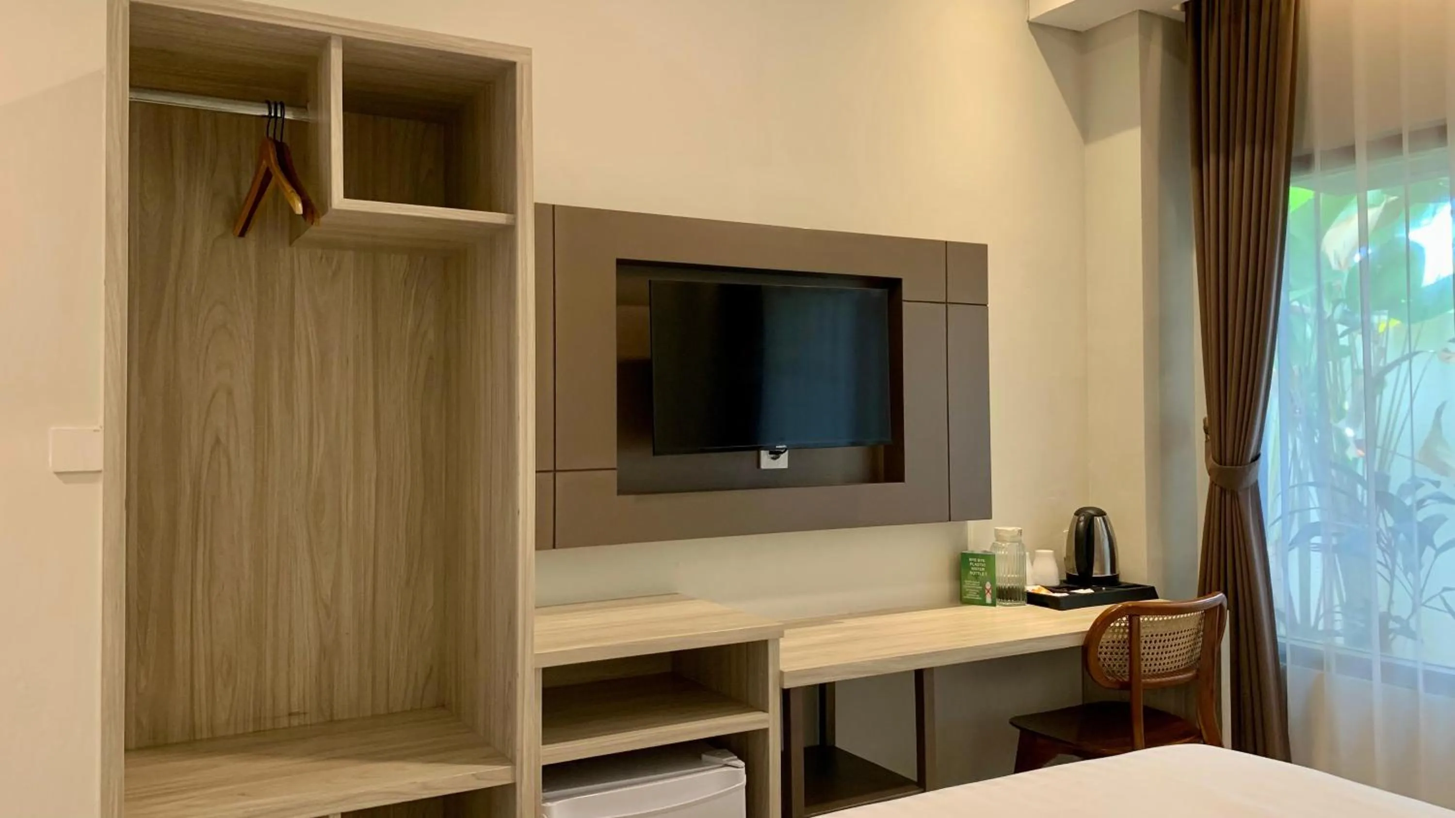 TV and multimedia, Bed in The Baliem Hotel