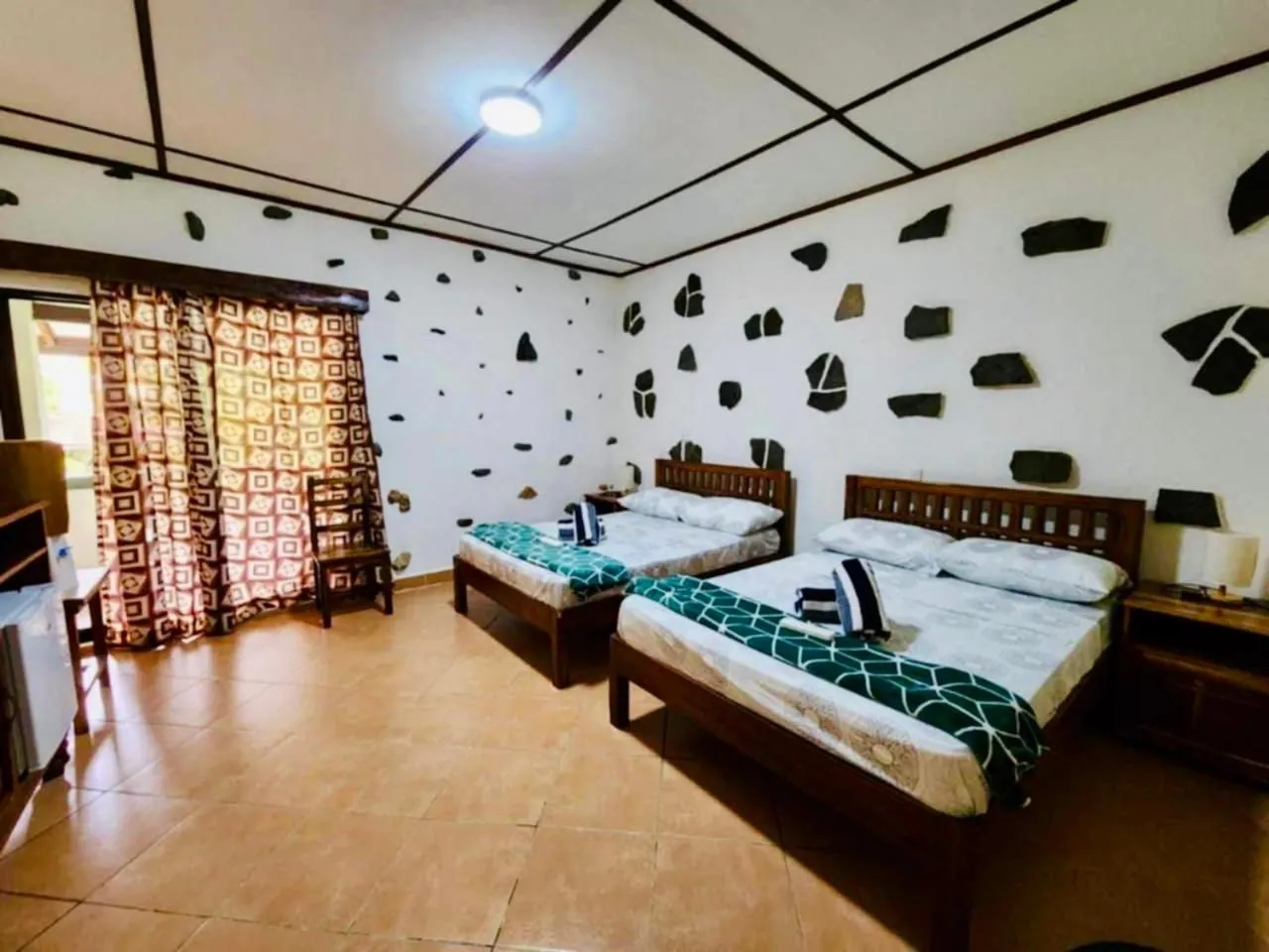 Bed in TipTop Hotel, Resto and Delishop