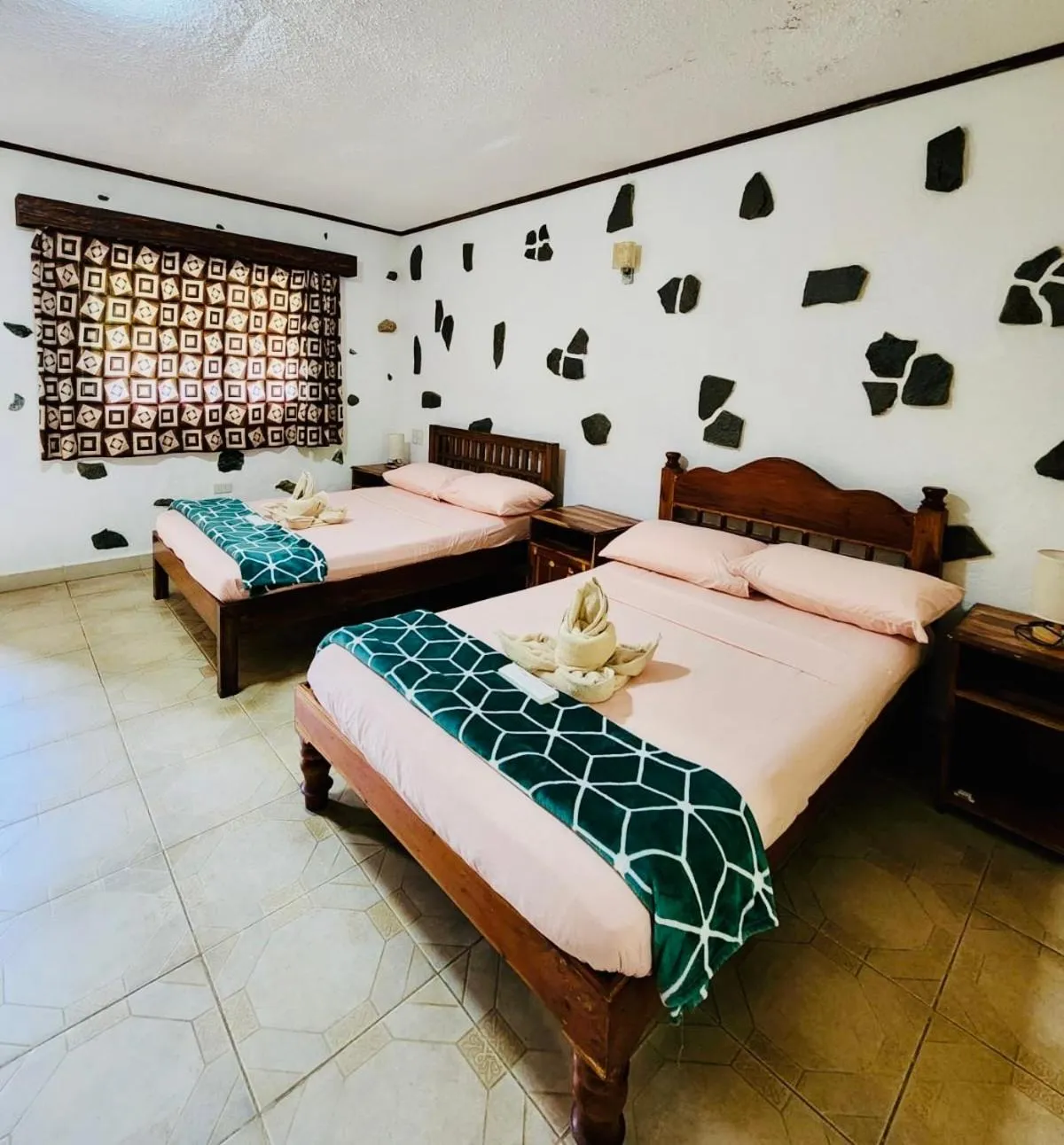 Bed in TipTop Hotel, Resto and Delishop