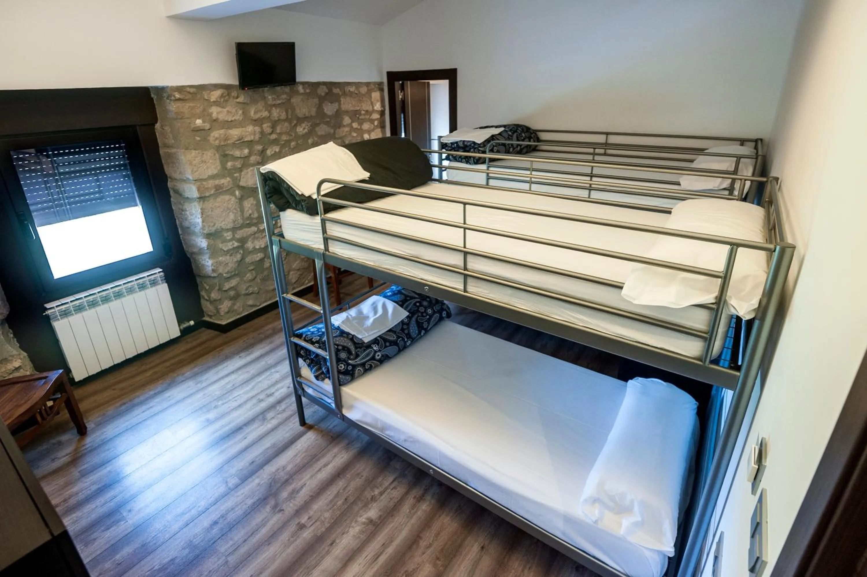 Photo of the whole room, Bed in Albergue turístico "La Fábrica"