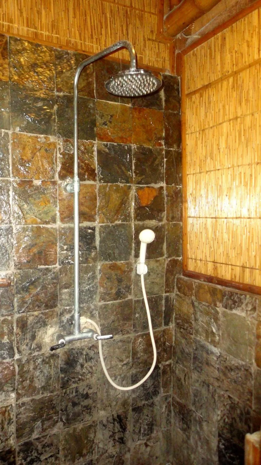 Bathroom in The Coral Blue Oriental Beach Villas and Suites