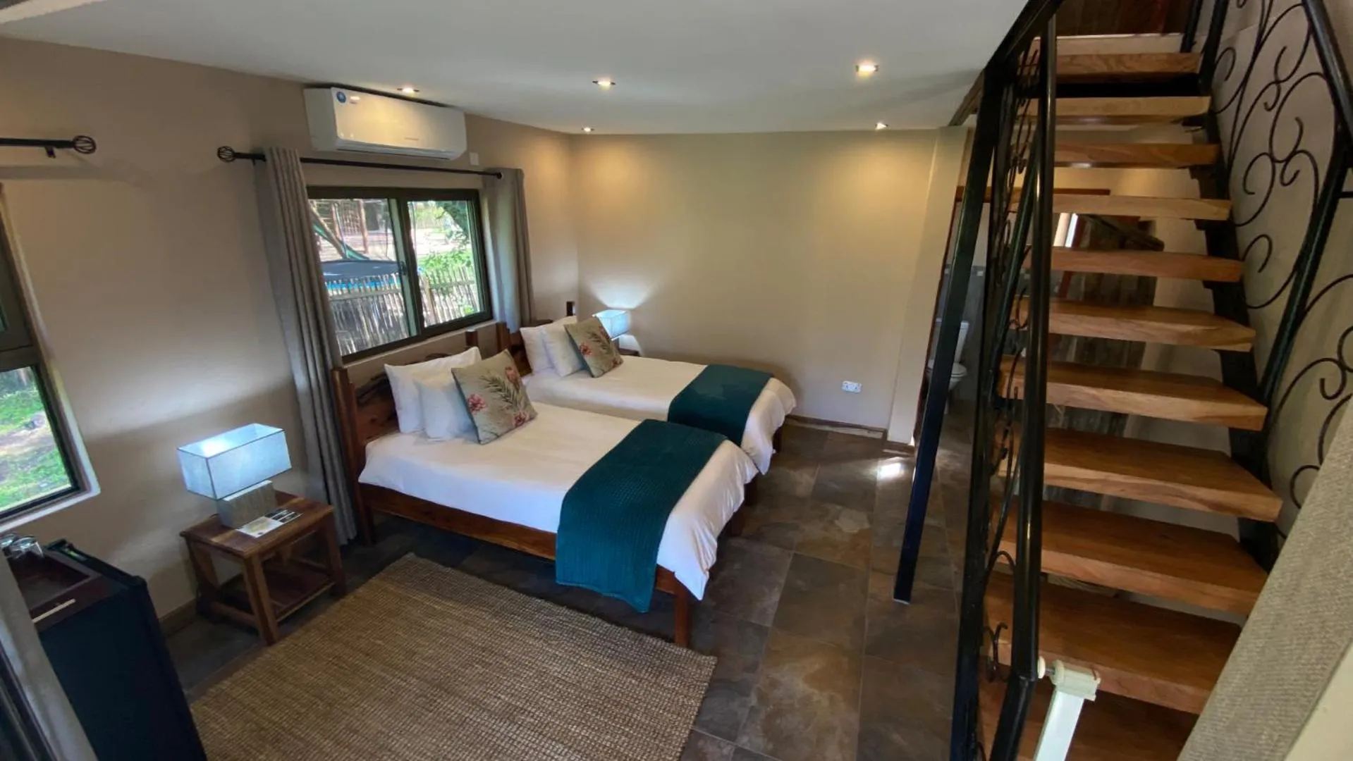 Bed in Maramba River Lodge
