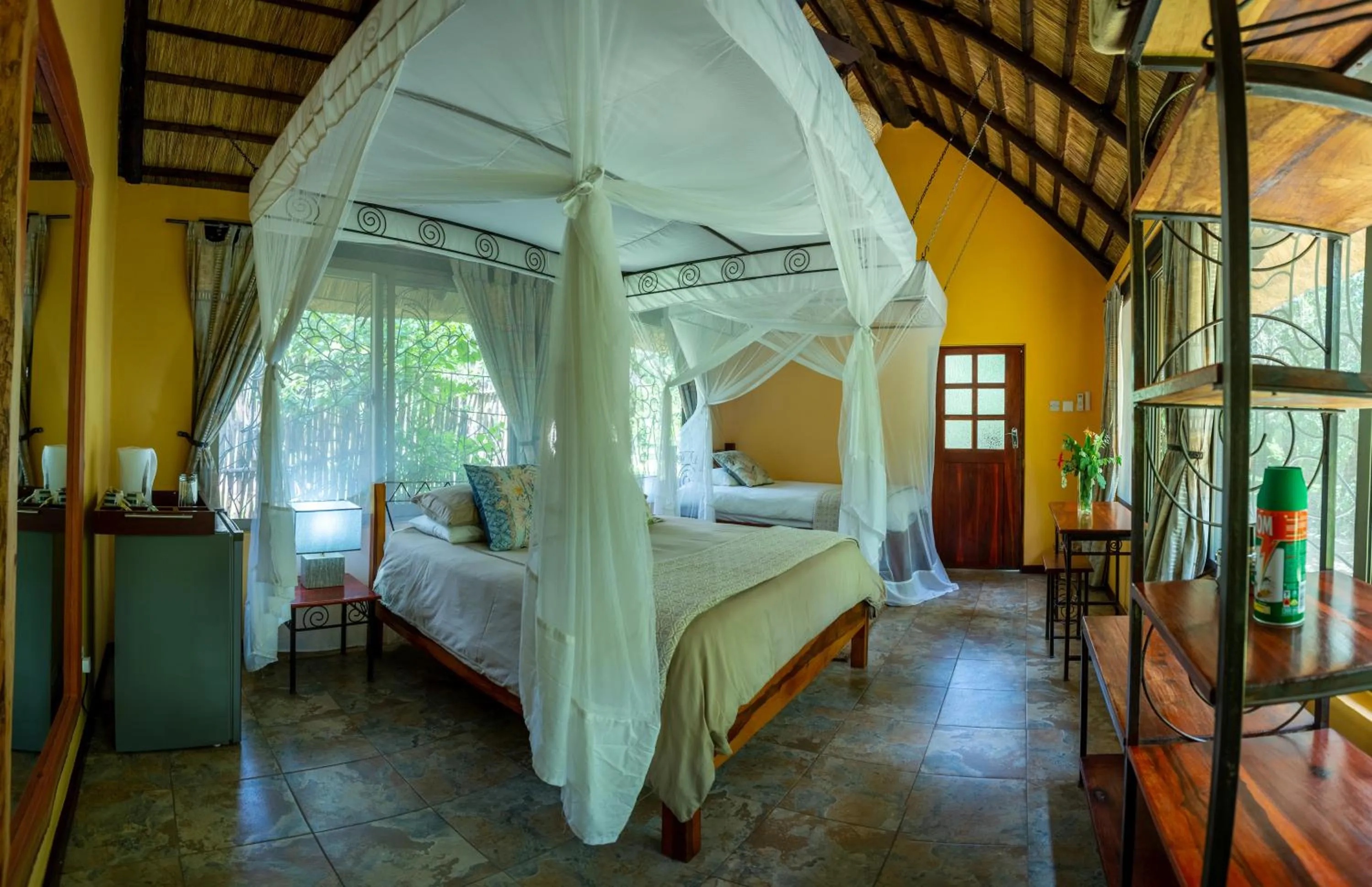 Bed in Maramba River Lodge
