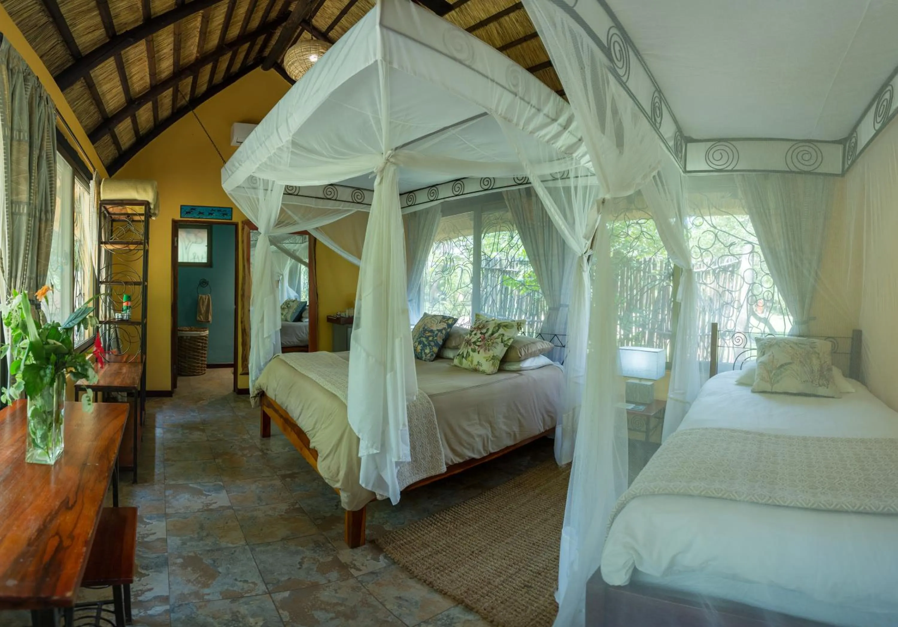 Bed in Maramba River Lodge