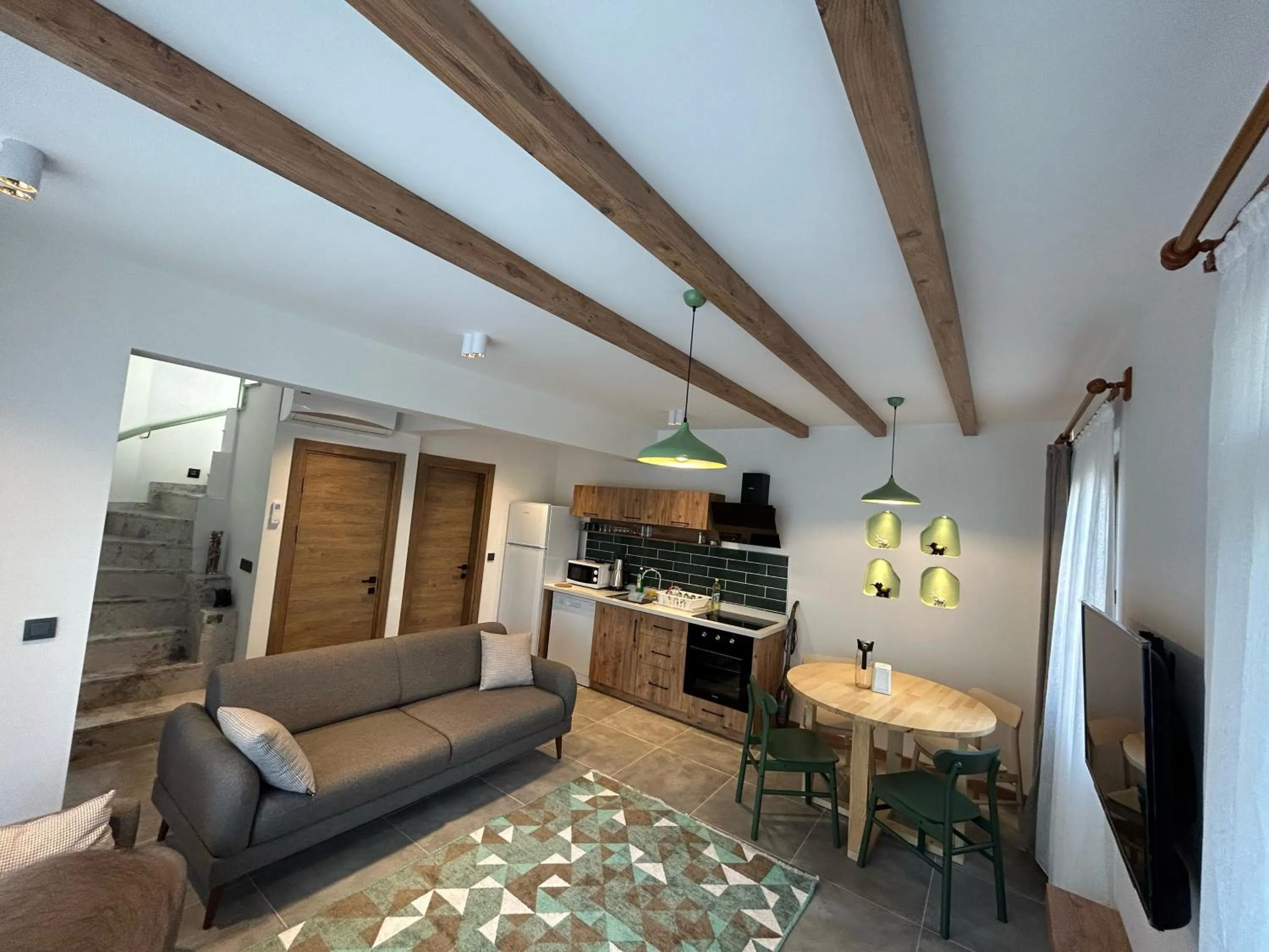 Communal lounge/ TV room in Avlu Villas & Apartments