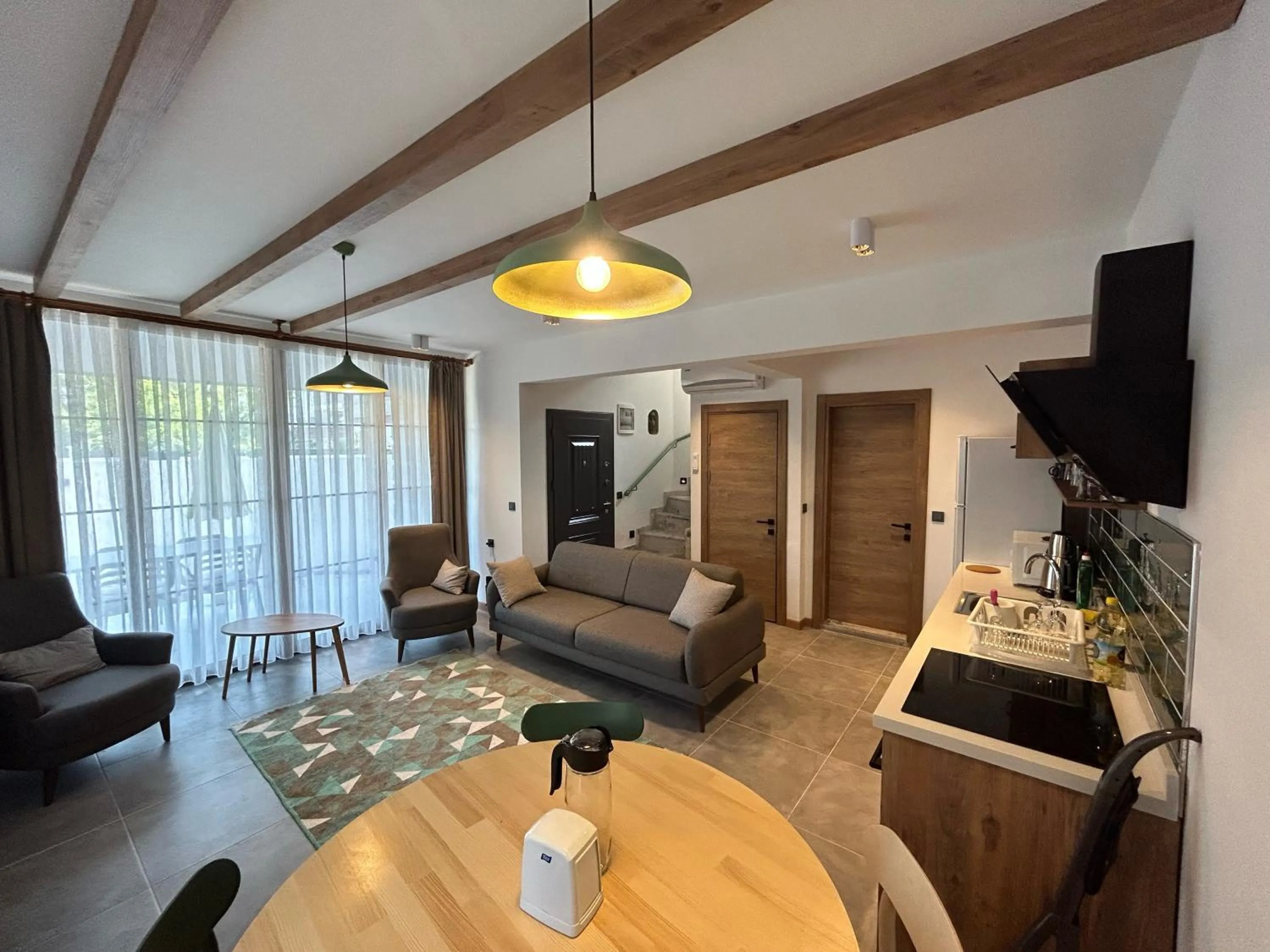 Communal lounge/ TV room in Avlu Villas & Apartments