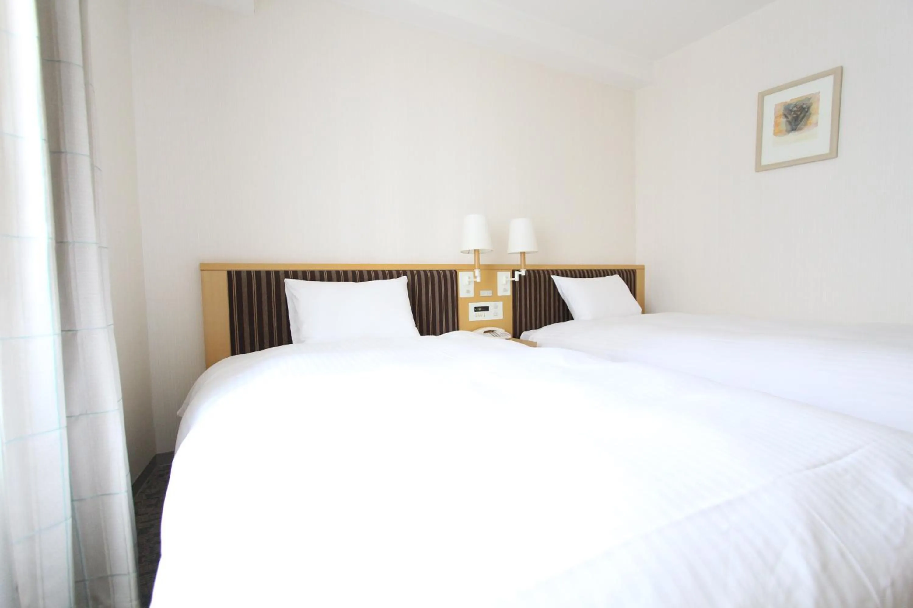 Photo of the whole room, Bed in KOKO HOTEL Sendai Station South