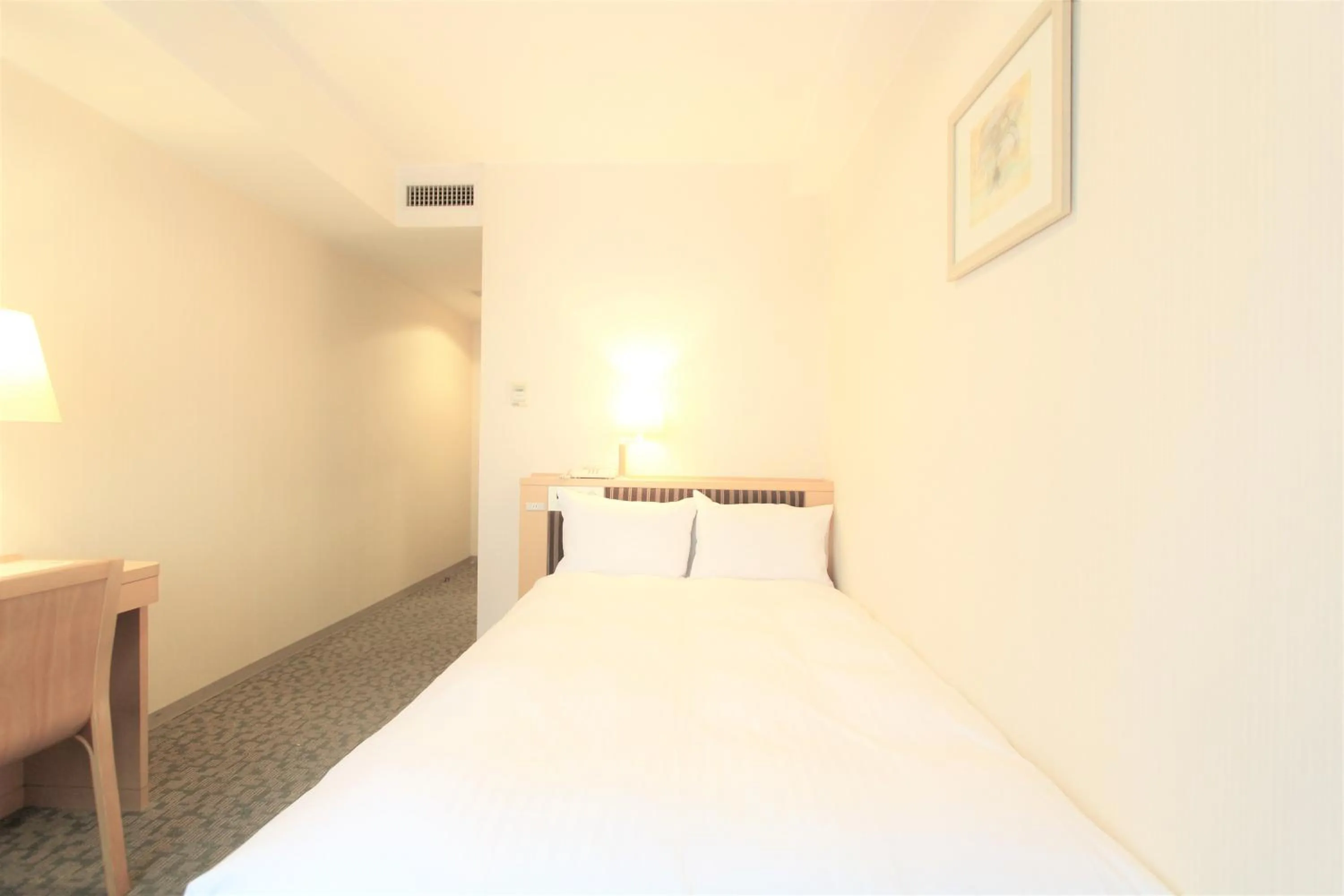 Photo of the whole room, Bed in KOKO HOTEL Sendai Station South