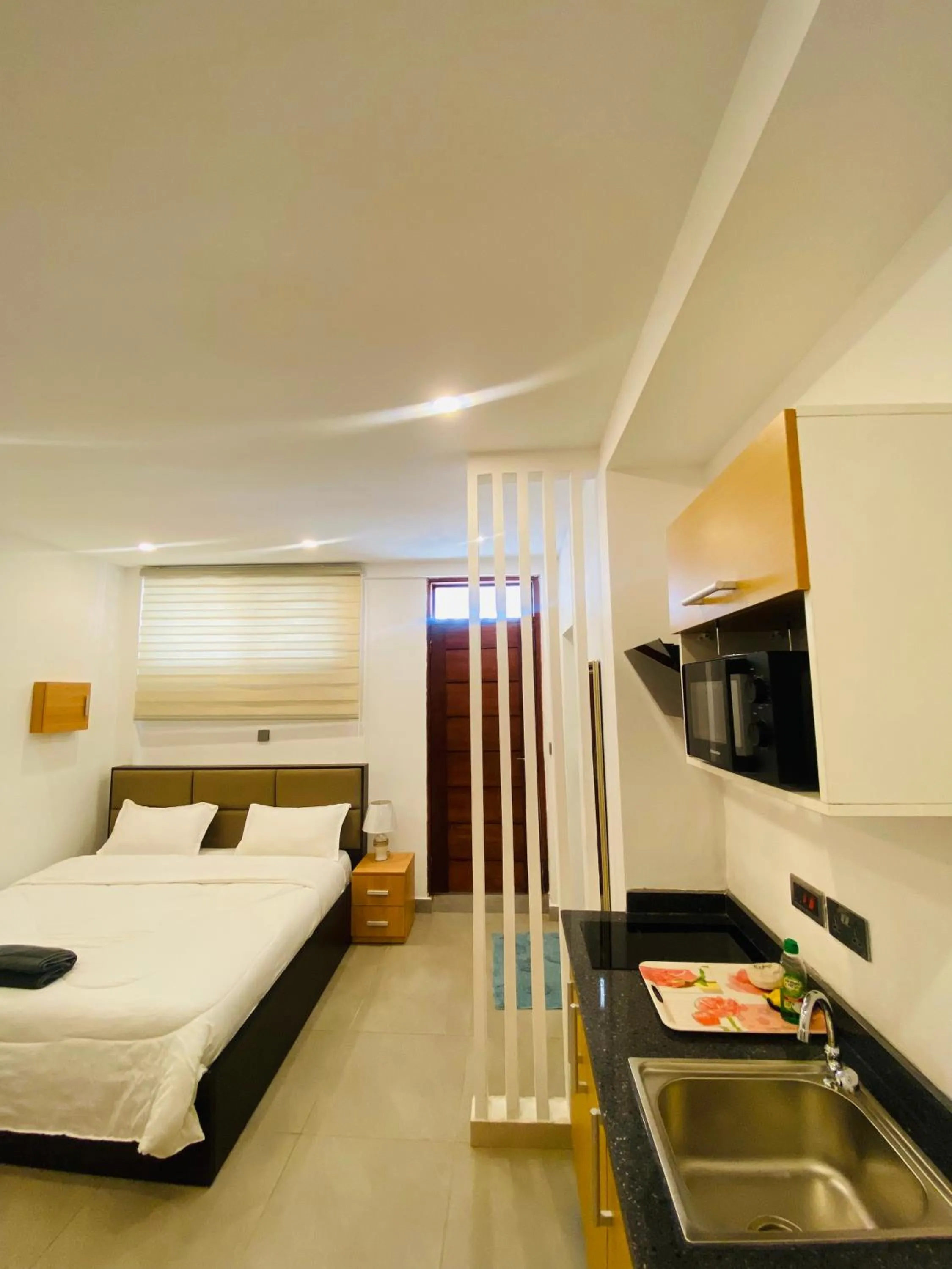 Photo of the whole room, Bed in Mayama Residences