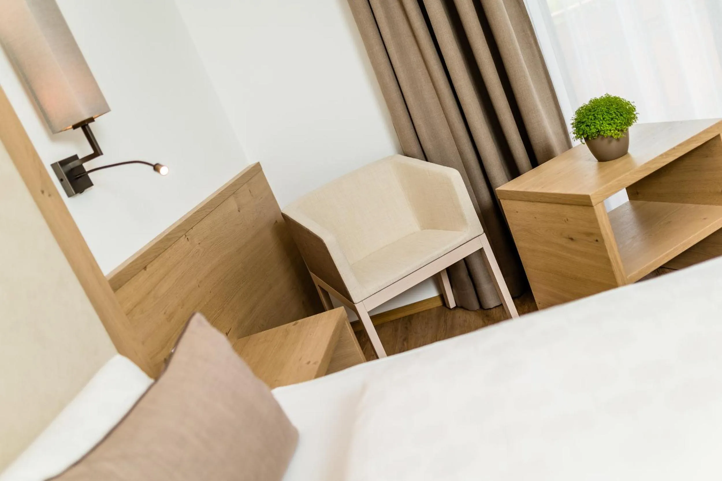 Photo of the whole room, Bed in Garni Hotel Am Meilenstein