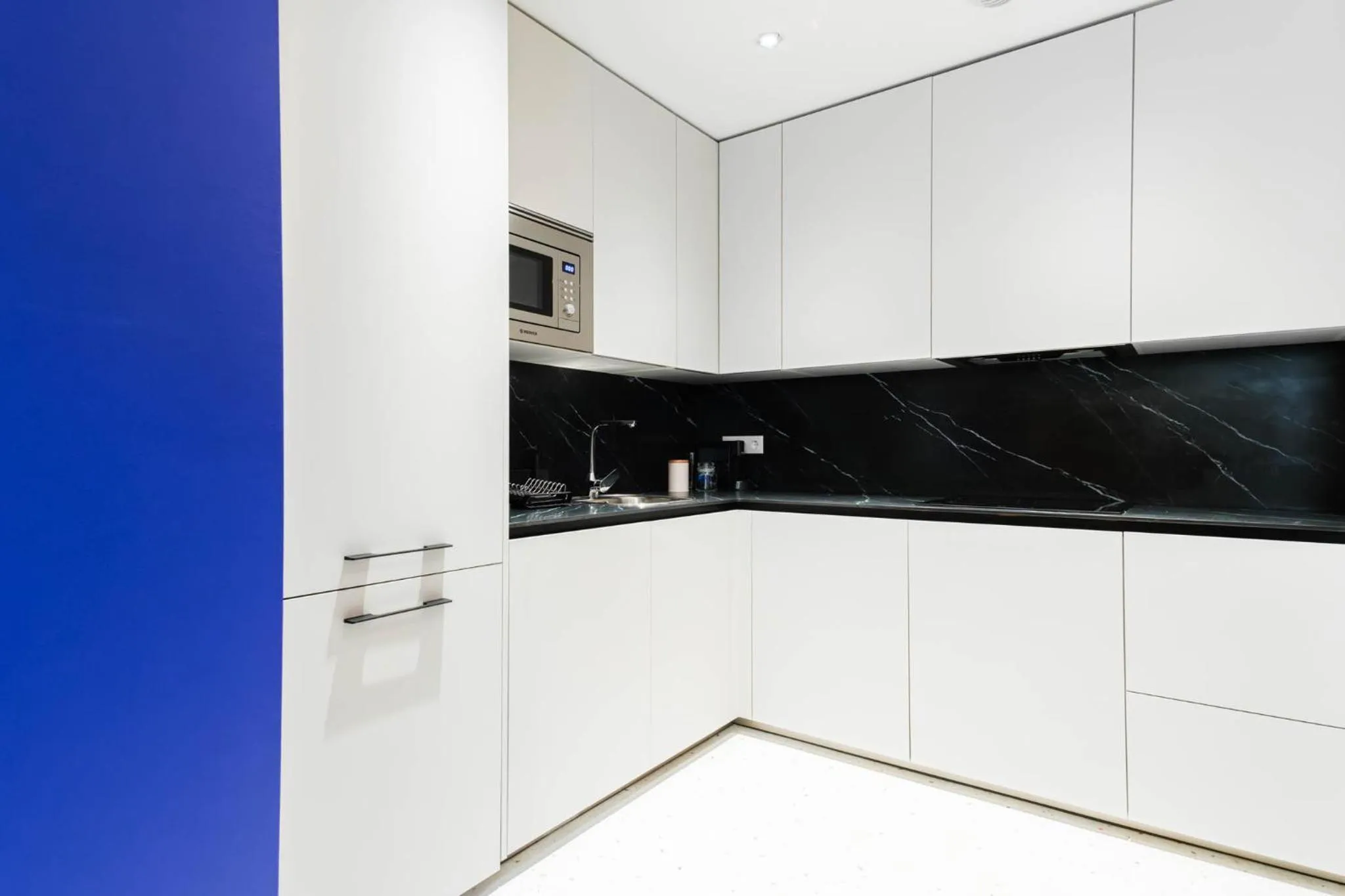 Kitchen or kitchenette in Apartamentos El Reloj