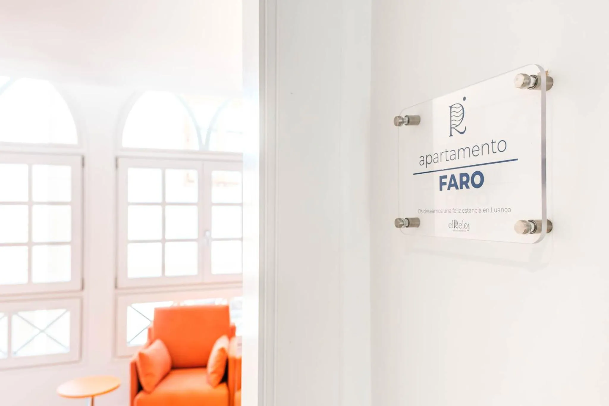 Property logo or sign in Apartamentos El Reloj