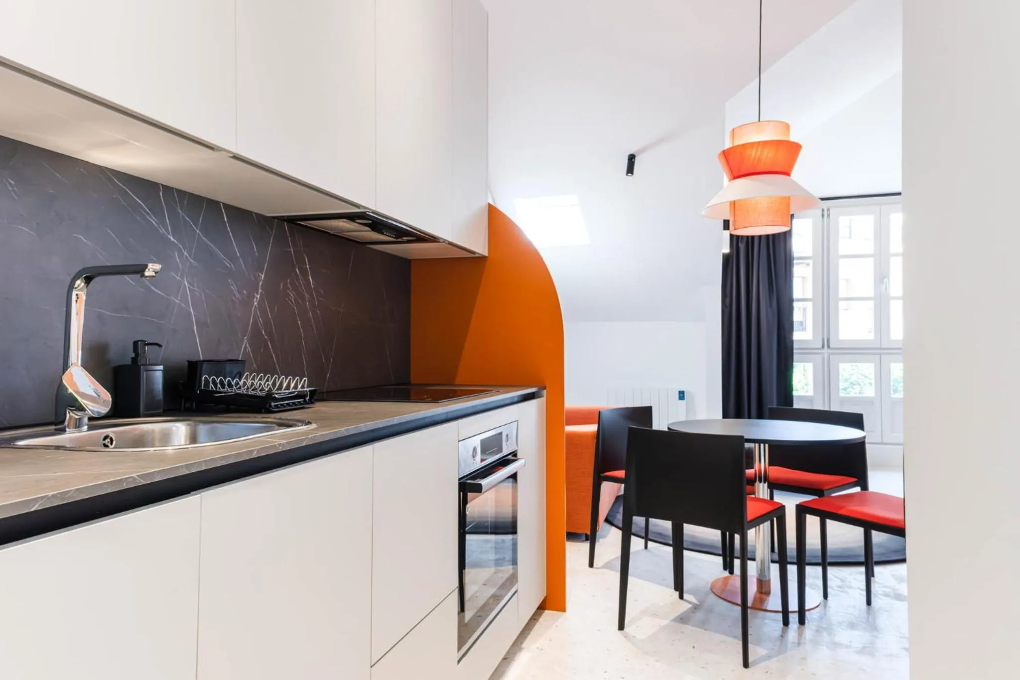 Kitchen or kitchenette in Apartamentos El Reloj