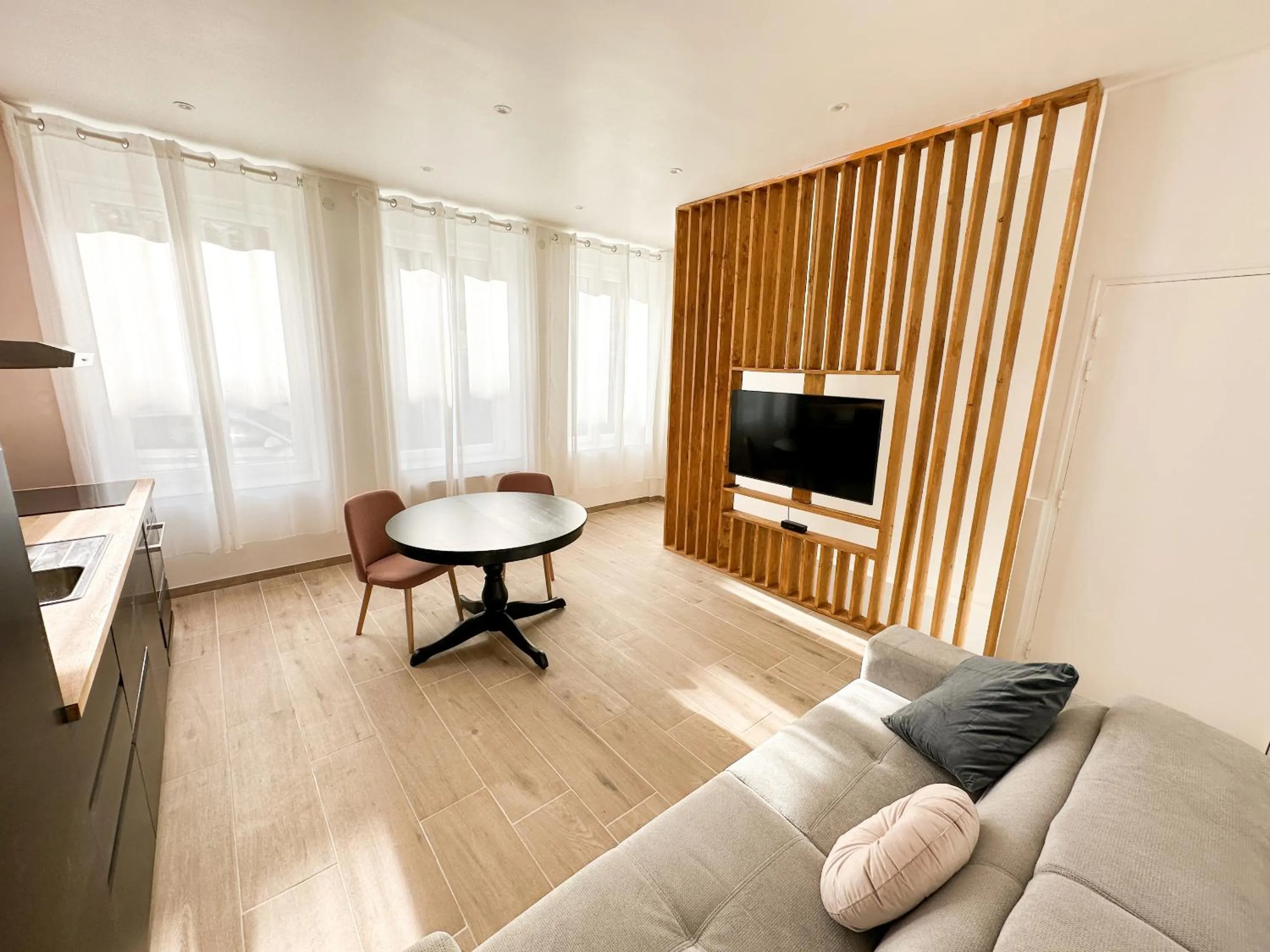 Living room in Le Bijou - Appartement, Sauna et Jacuzzi - Lille