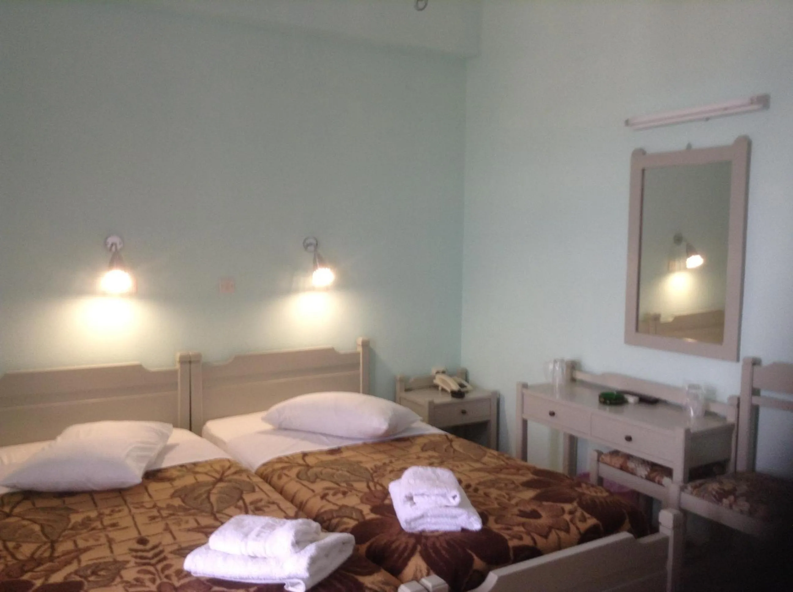 Bedroom in Haritos Hotel - Geothermal Hot Swimming Pool