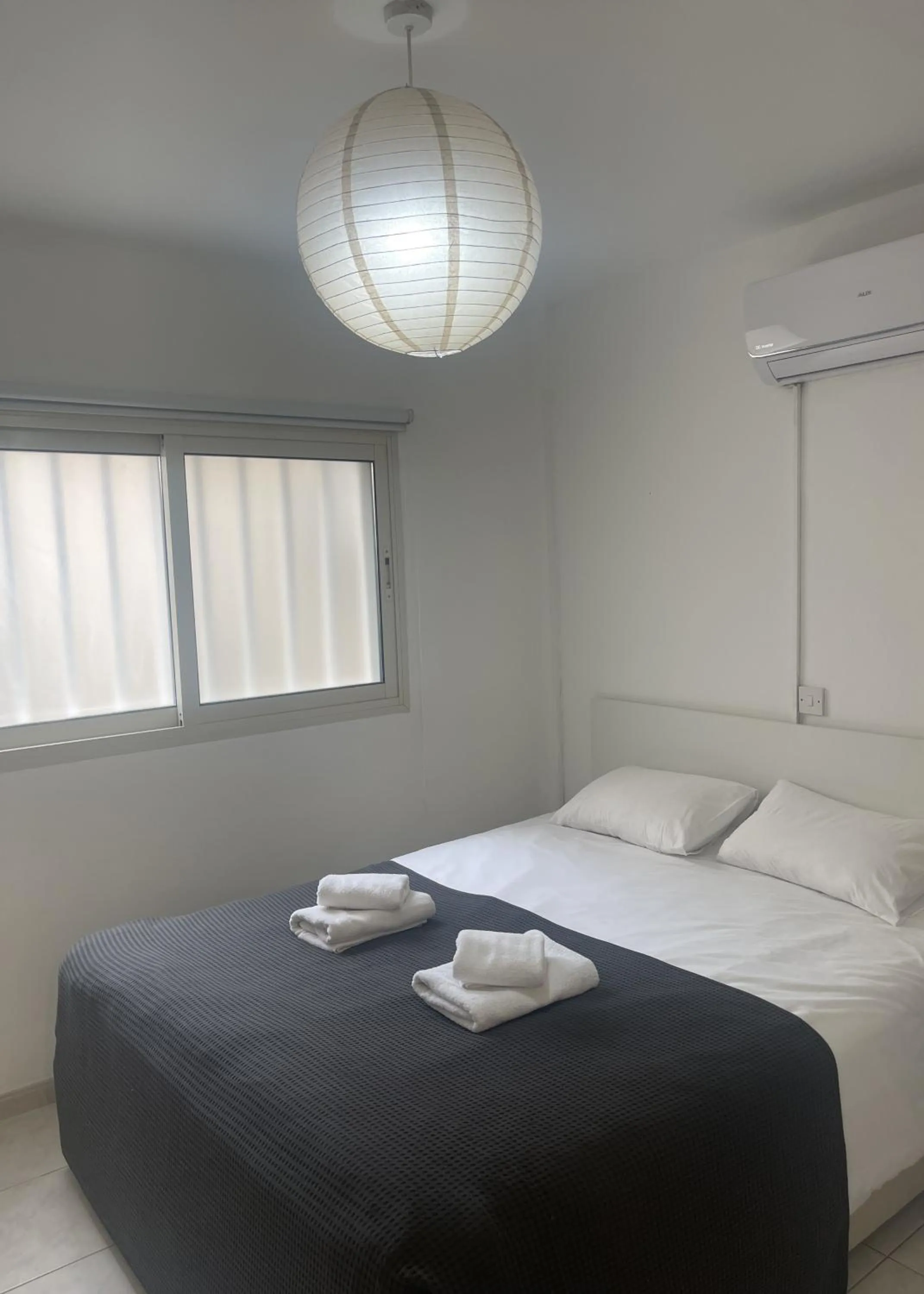 Bed in Stephanie City Apartments