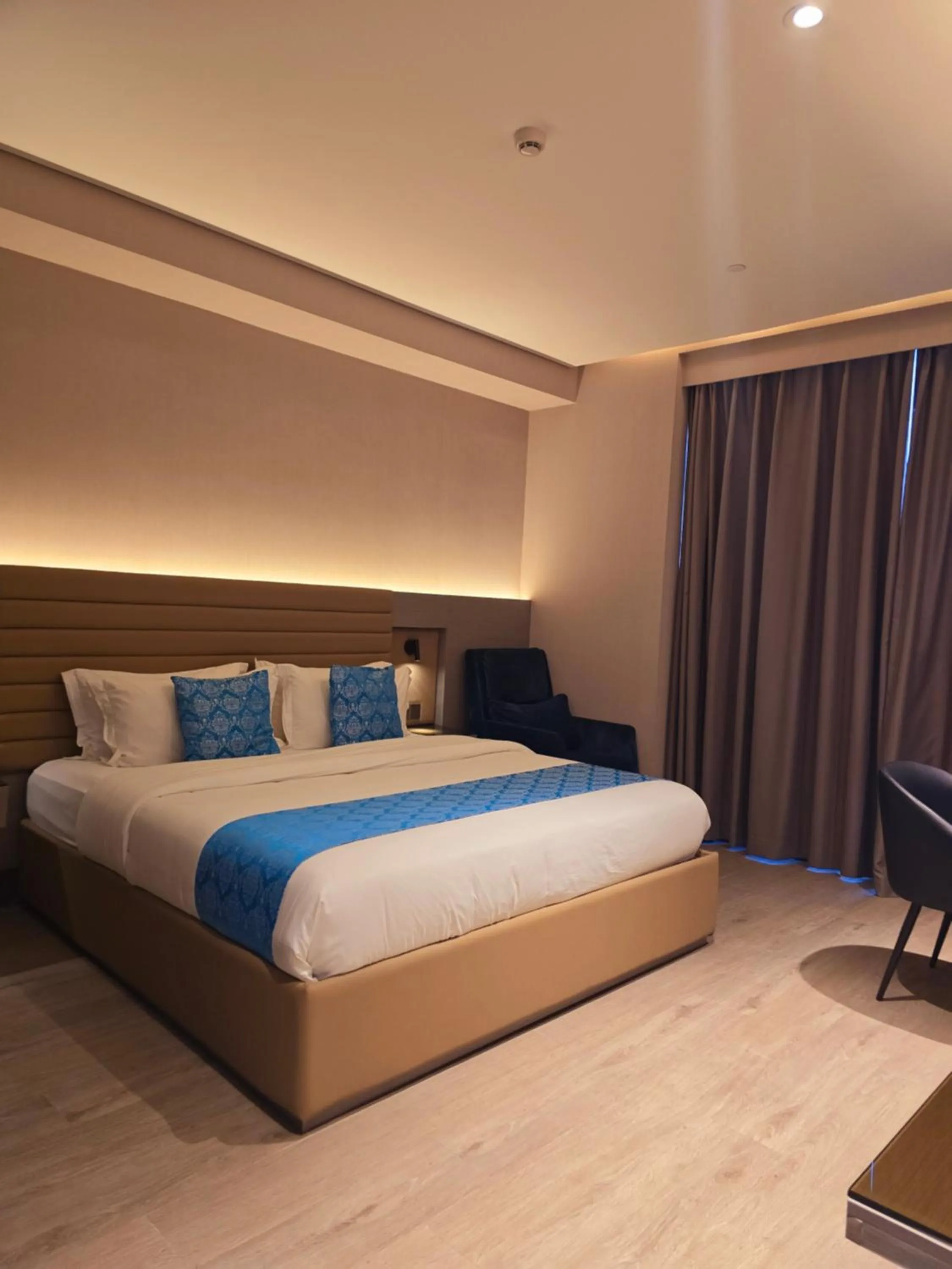 Bed in Bayprime Hotel