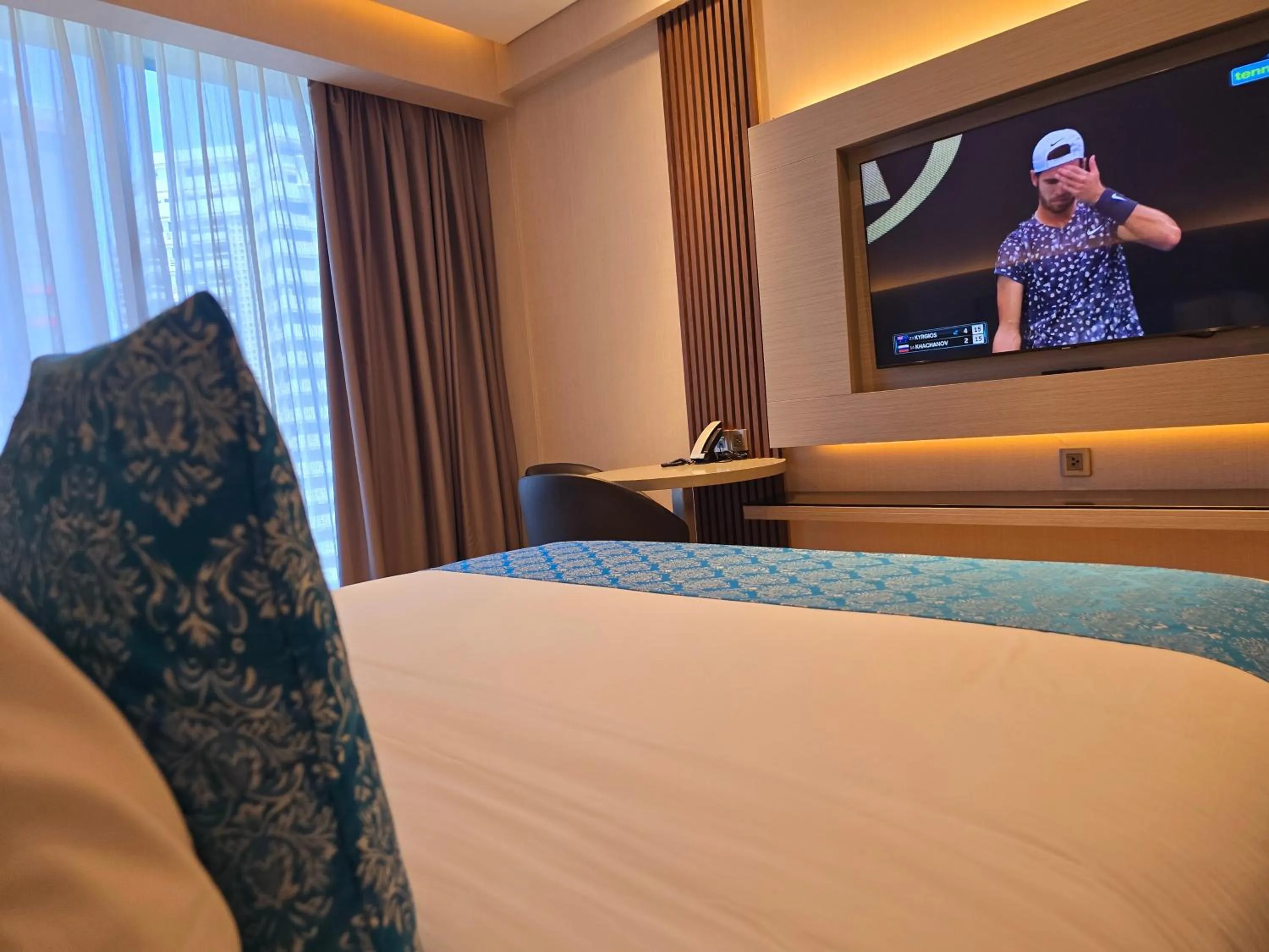 Bed in Bayprime Hotel