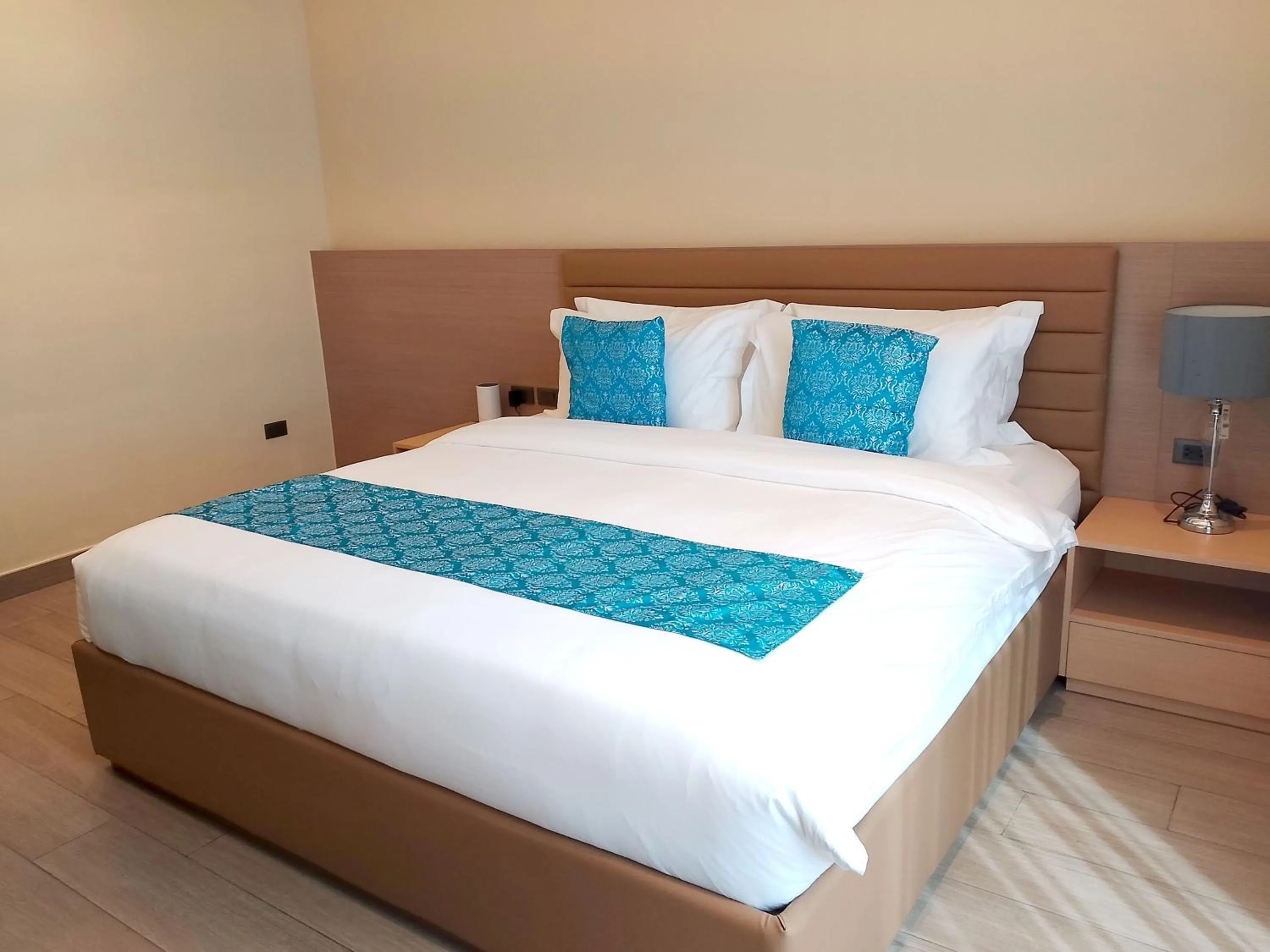 Bed in Bayprime Hotel