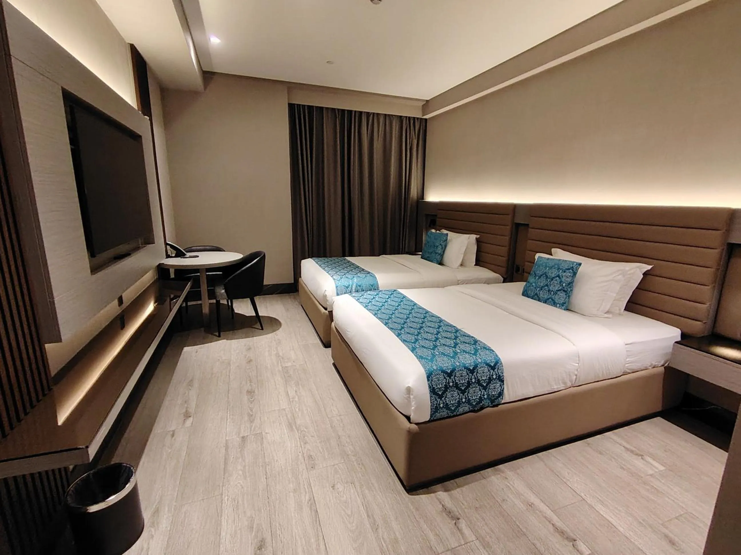 Bed in Bayprime Hotel