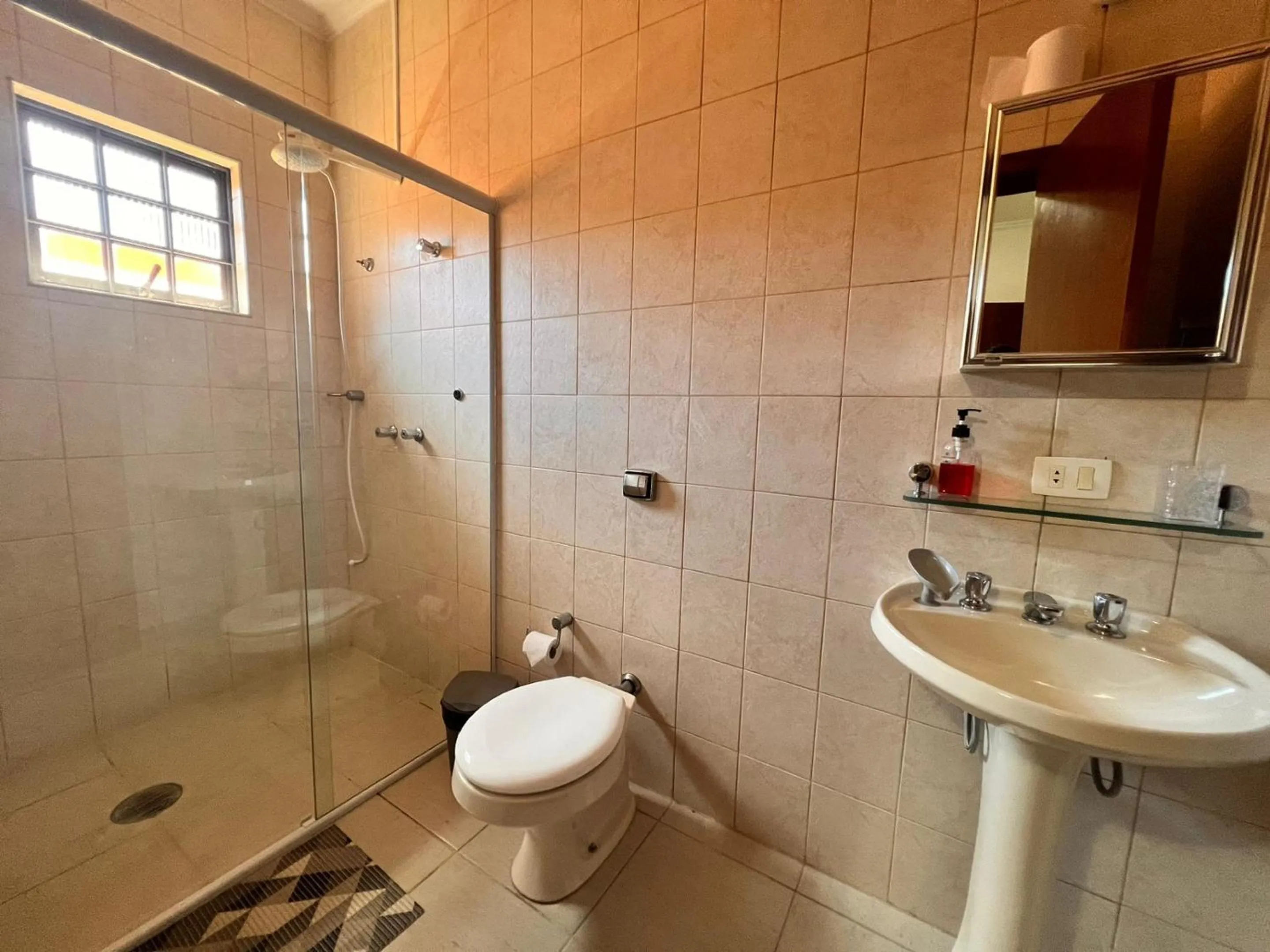 Toilet in Residencia Dago Suítes