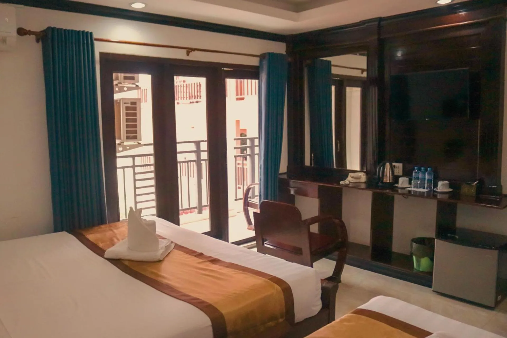 Living room, Bed in Vang Vieng Consiana Hotel