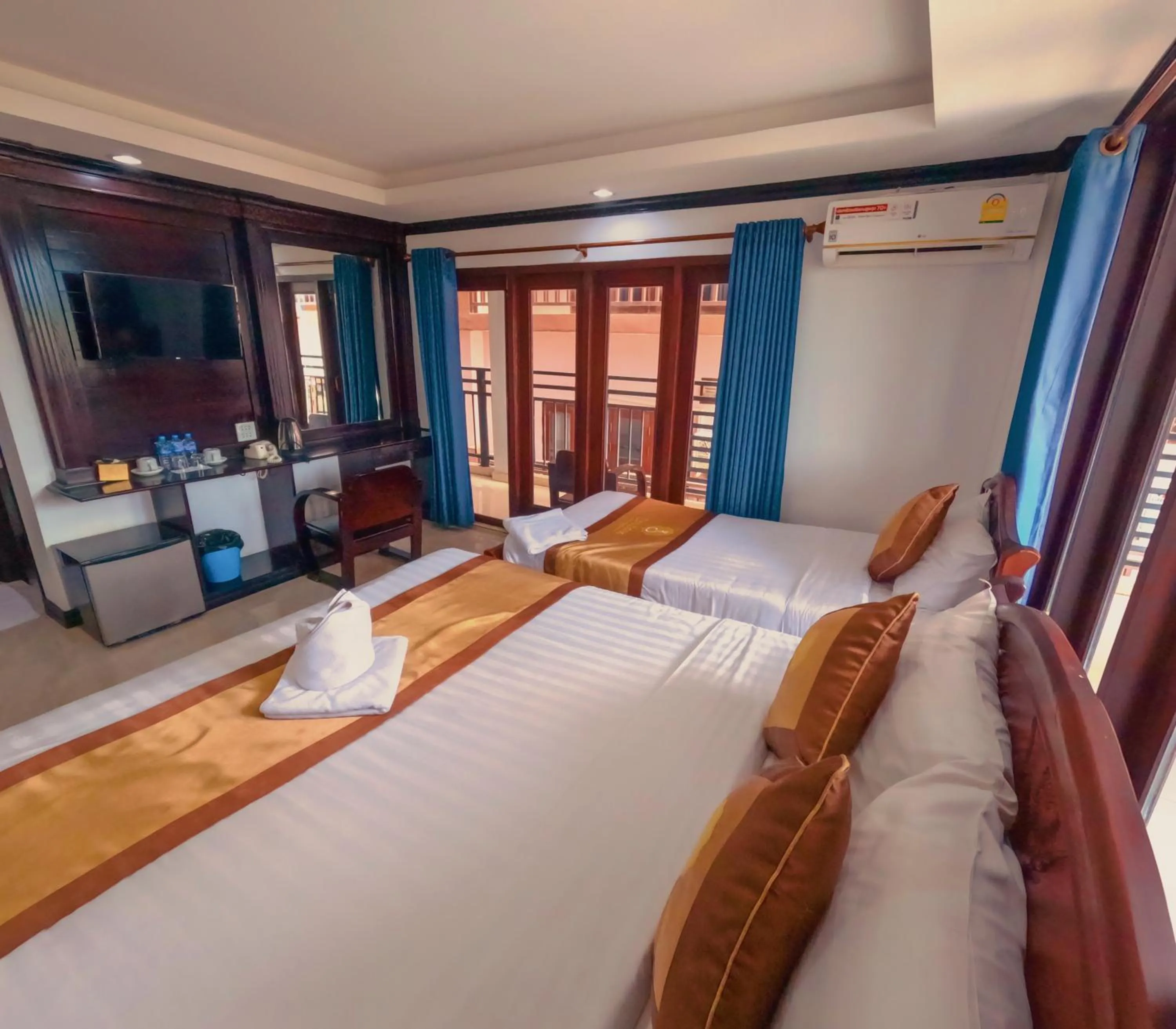 Bed in Vang Vieng Consiana Hotel